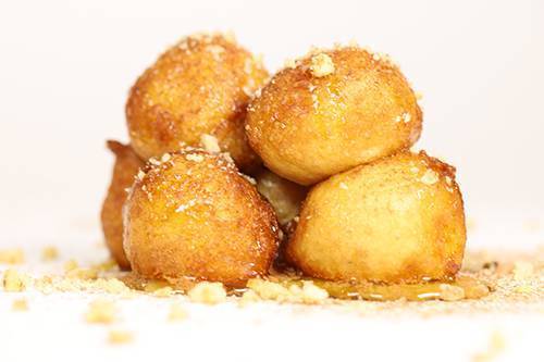 Order Loukoumades food online from Nick The Greek store, Castro Valley on bringmethat.com