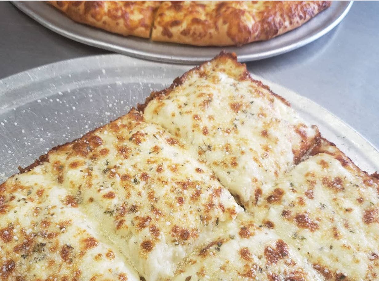 Order Square Deep Dish Cheese Pizza - Small (6 Pieces) food online from Zino's Subs & Pizza store, Madison Heights on bringmethat.com