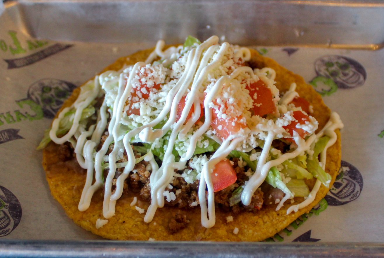Order Tostada food online from Cantina Louie store, Asheville on bringmethat.com