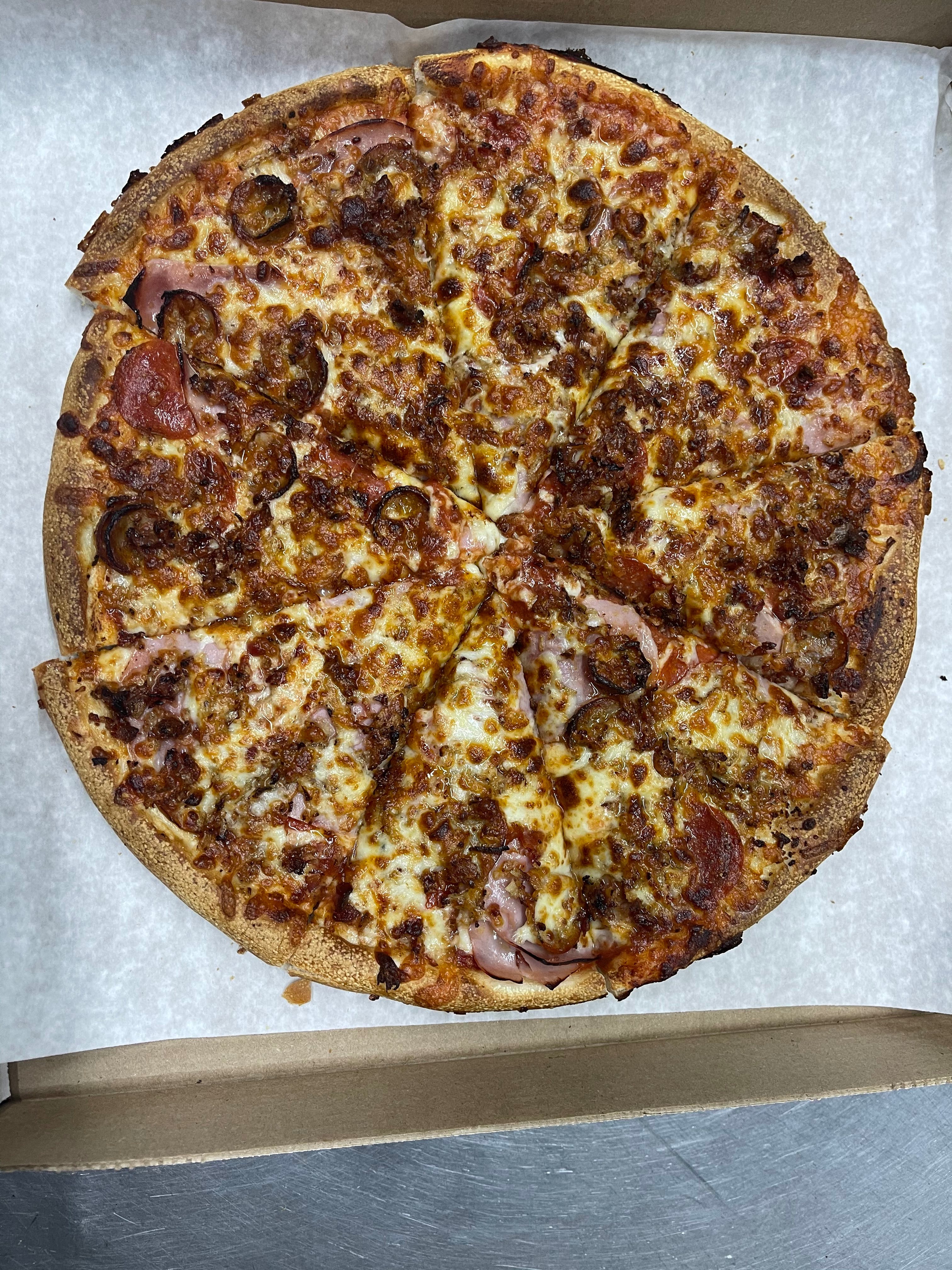 Order Meat Lover's Pizza - Small 10" food online from Village Pizza store, Ashburnham on bringmethat.com