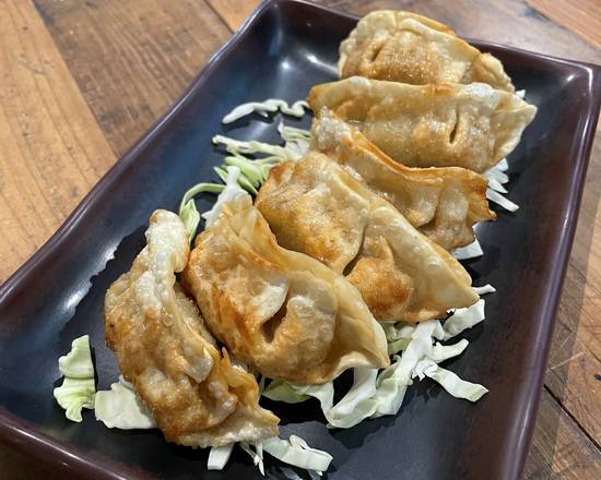 Order Gyoza (4 pcs) food online from Tiger Asian Express store, Farmers Branch on bringmethat.com