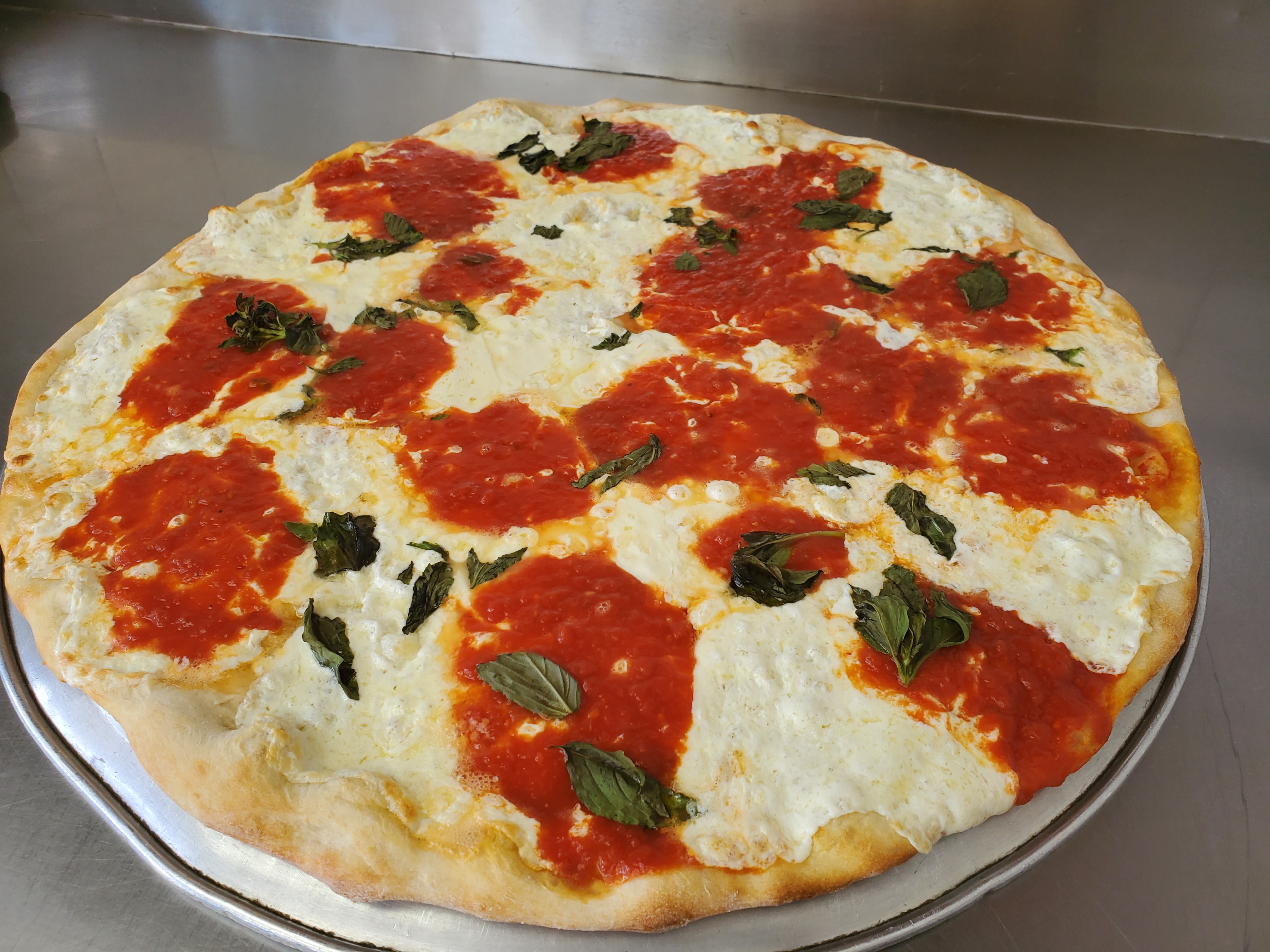 Order Margherita Pie food online from Gino's pizzeria & restaurant catering store, Astoria on bringmethat.com
