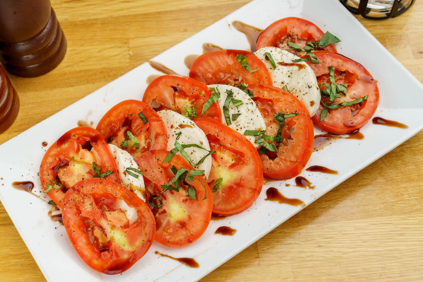 Order Caprese Salad food online from Caffe Amici store, Columbus on bringmethat.com