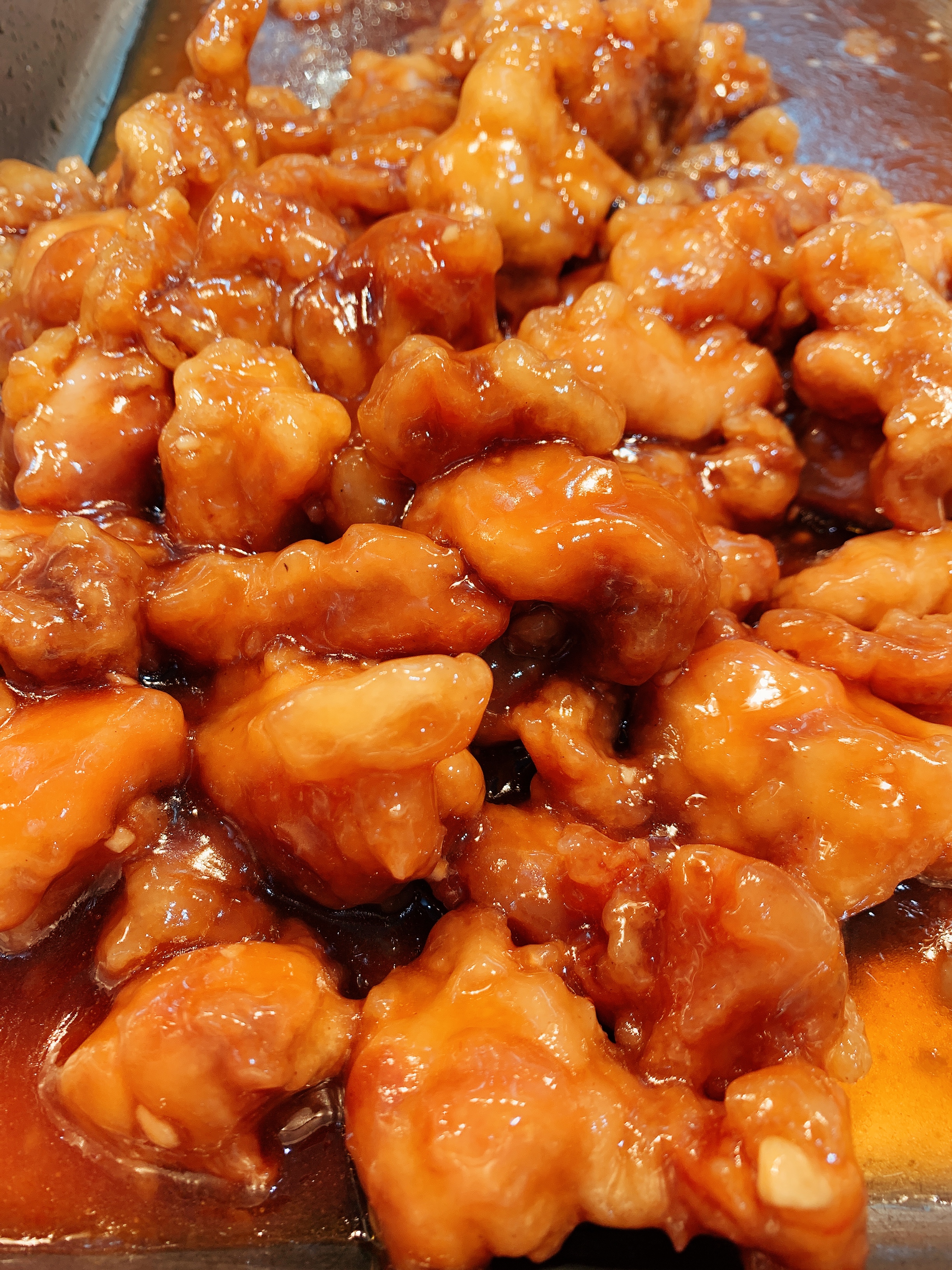 Order Orange Chicken food online from Famous Cajun Grill store, Oklahoma City on bringmethat.com