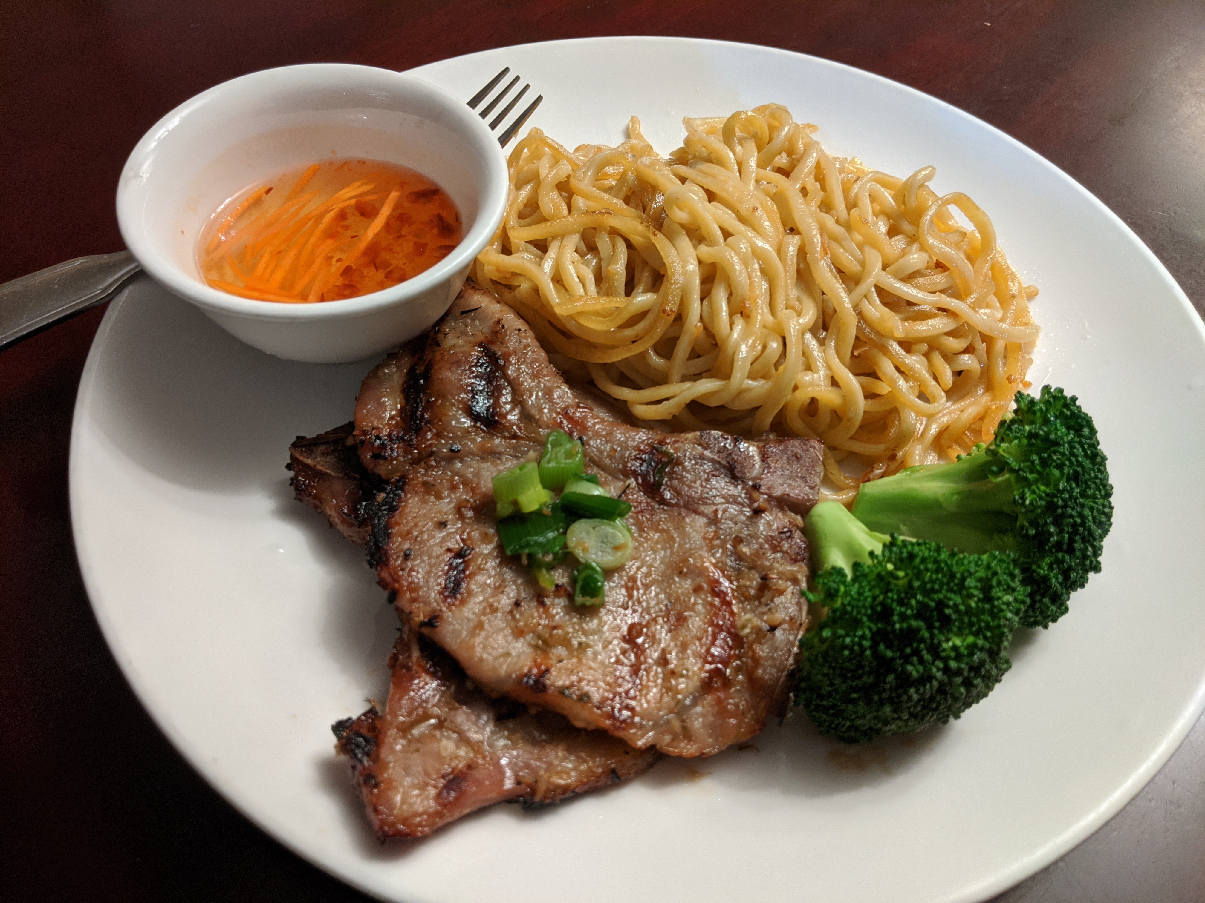 Order M3. Garlic Noodle with Grilled Pork Chop food online from Bac Lieu Restaurant store, San Francisco on bringmethat.com