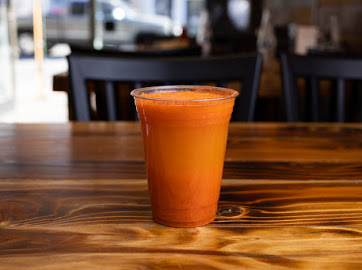 Order Carrots and Orange Juice (16OZ) food online from Cafe Guatemalteco store, San Francisco on bringmethat.com