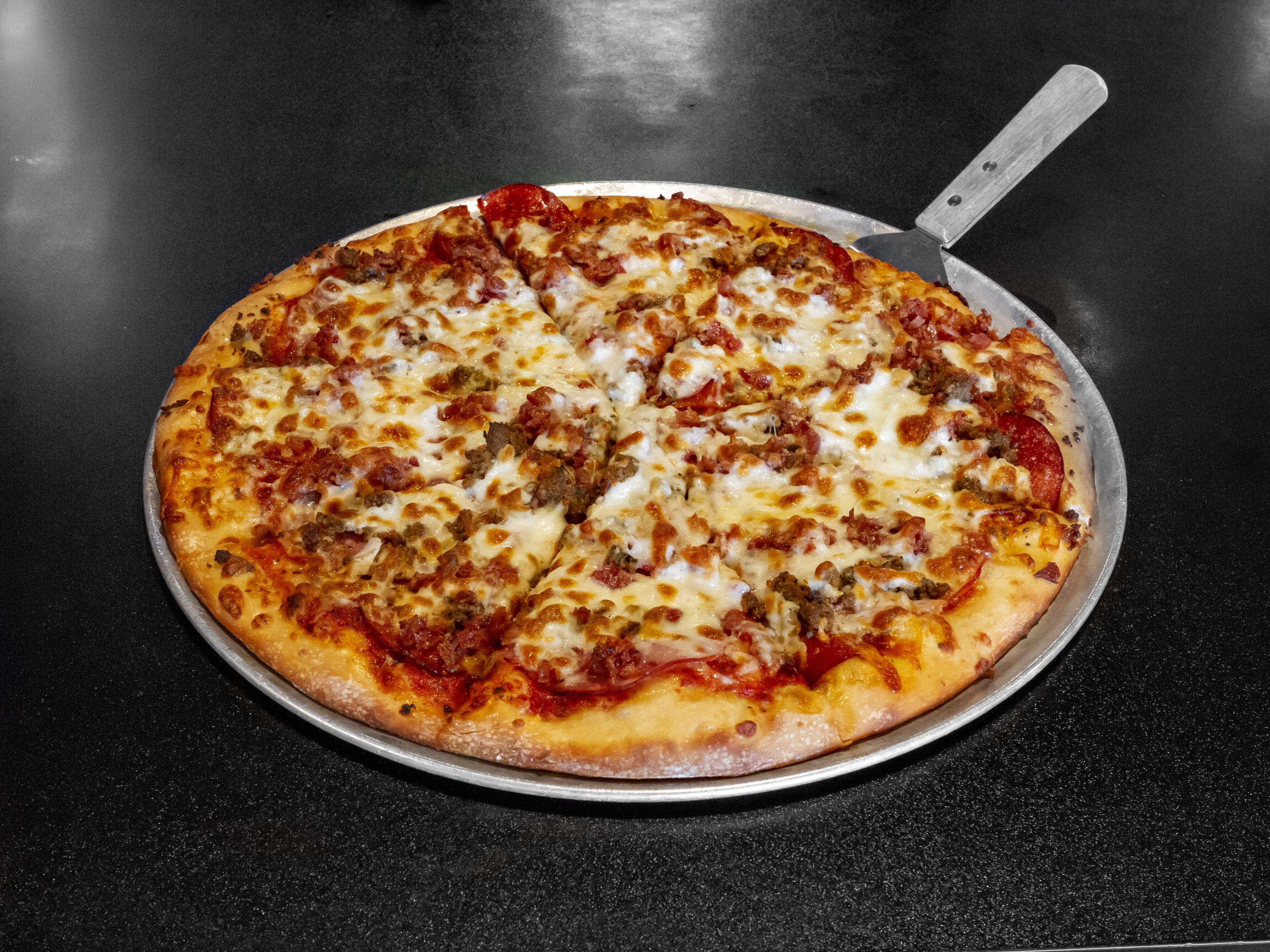 Order The Meat Coma  Pizza food online from Mcclain Pizzeria store, Spokane on bringmethat.com