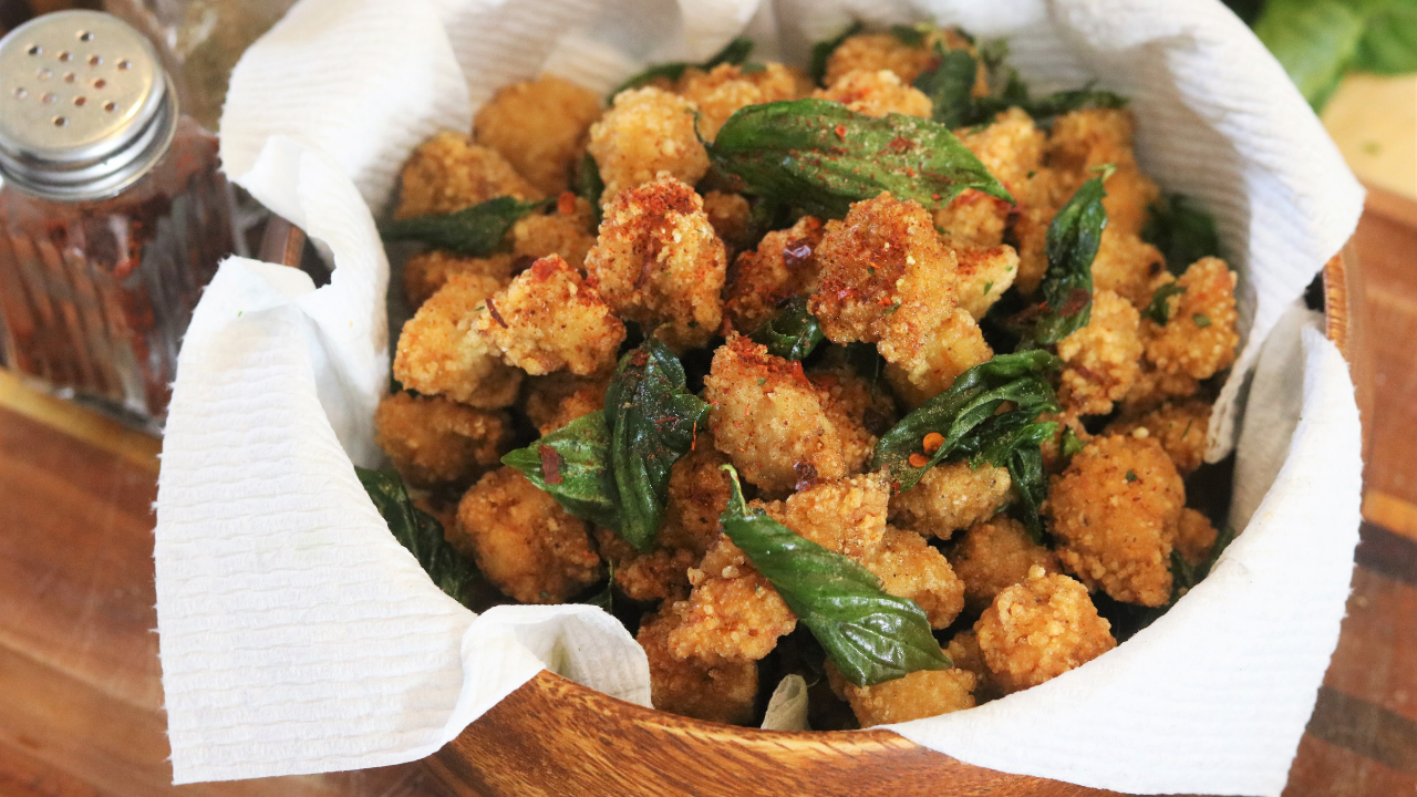 Order Spicy Basil Fried Popcorn Chicken food online from Le Cafe Market store, Arlington on bringmethat.com