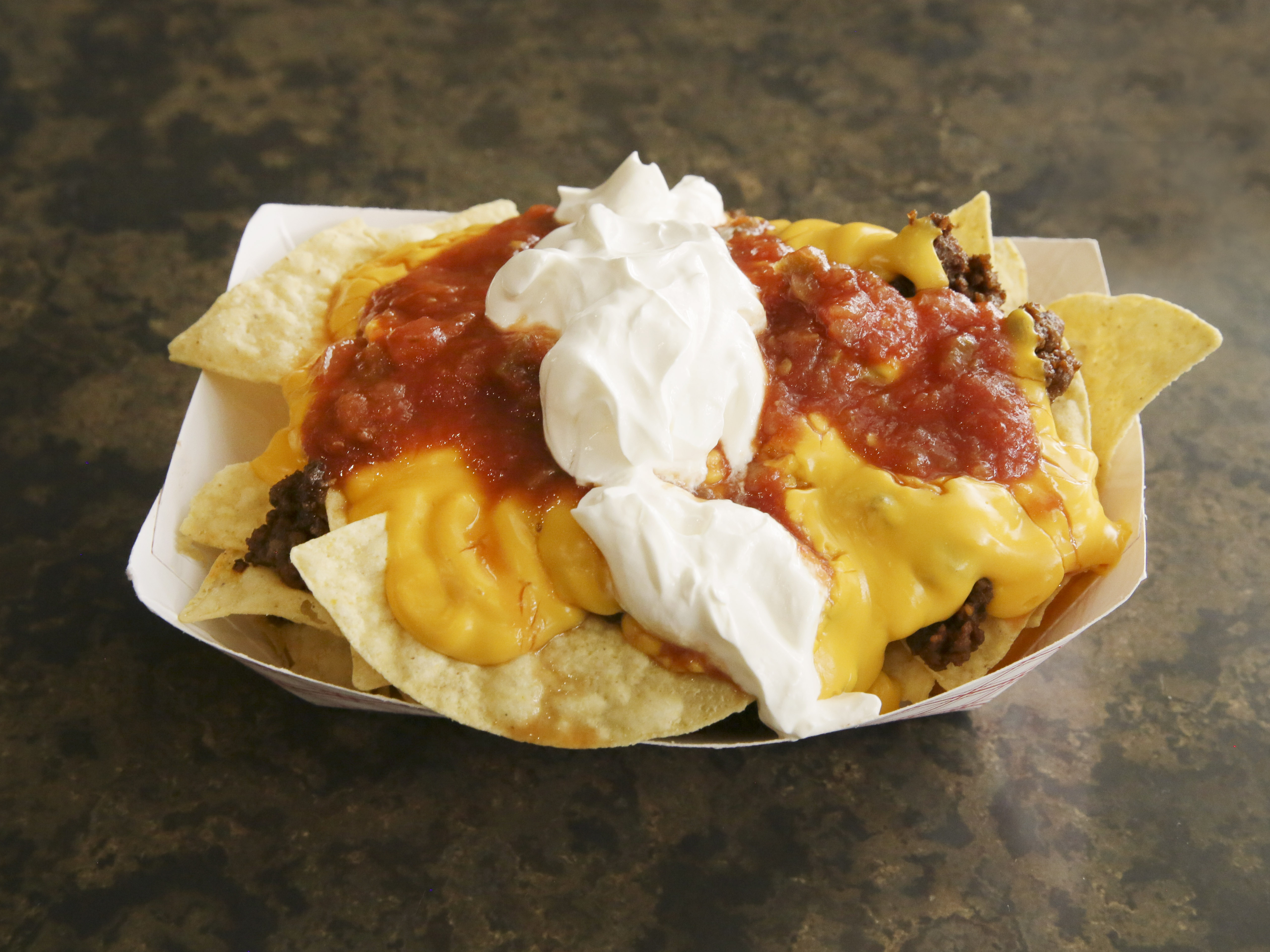 Order Loaded Nachos food online from Zappi Pizza store, Waukesha on bringmethat.com