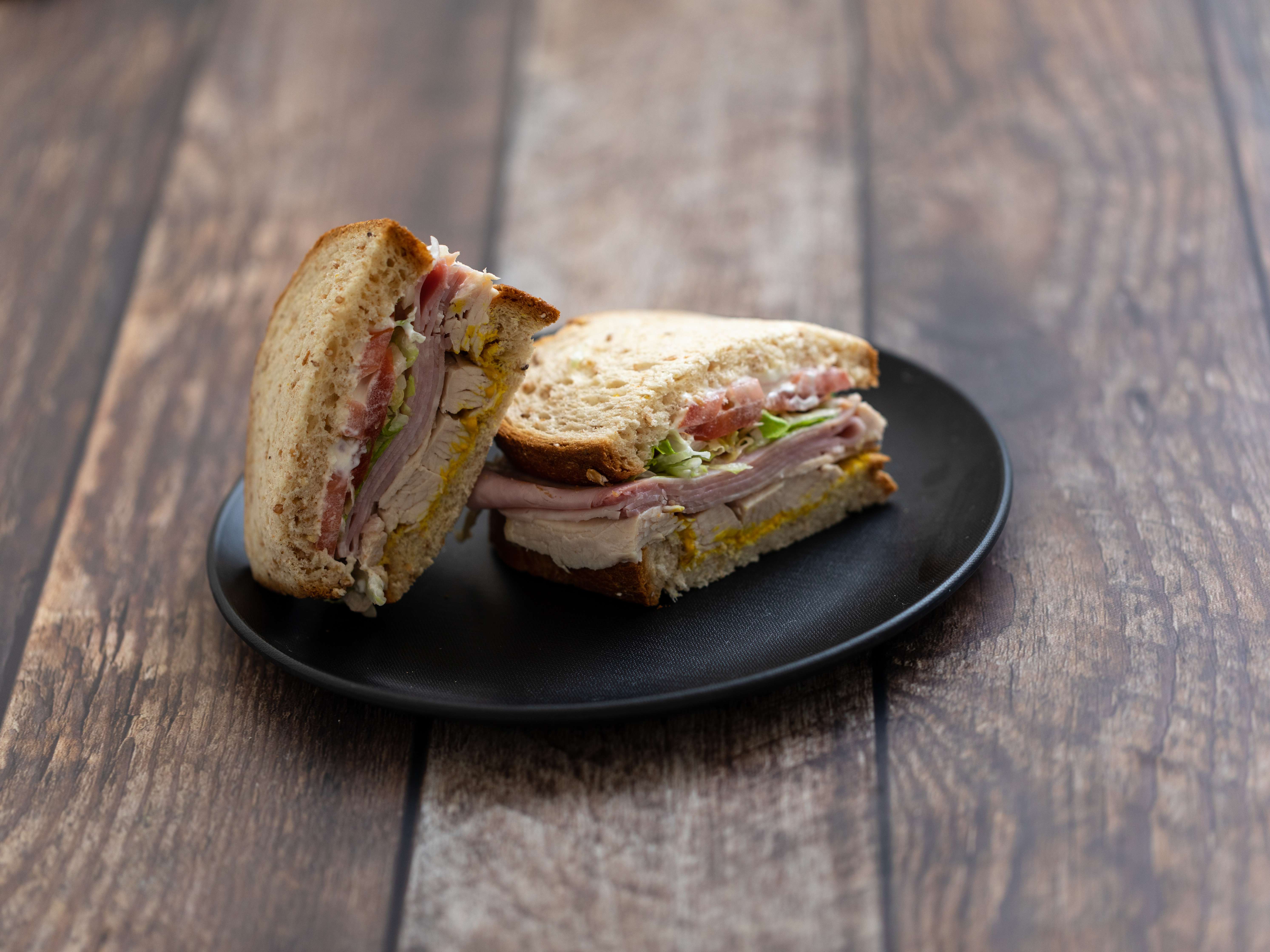 Order Ham and Turkey Club Sandwich food online from Grand Leader Market store, San Bruno on bringmethat.com