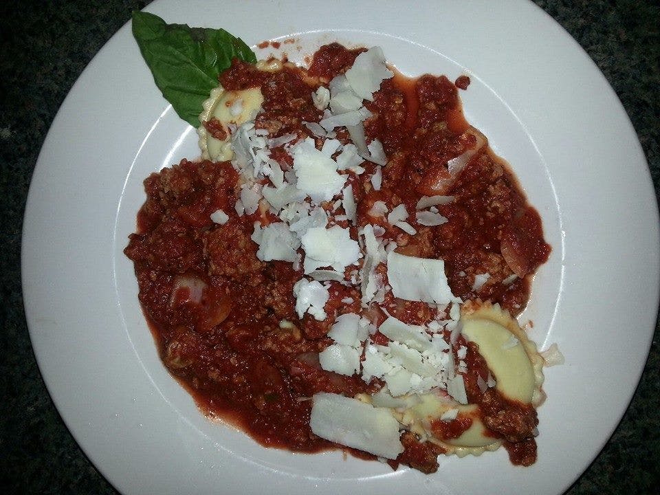 Order Cheese Ravioli with Spicy Rose Sauce - Pasta food online from Gennaro Cafe Italiano store, Denver on bringmethat.com