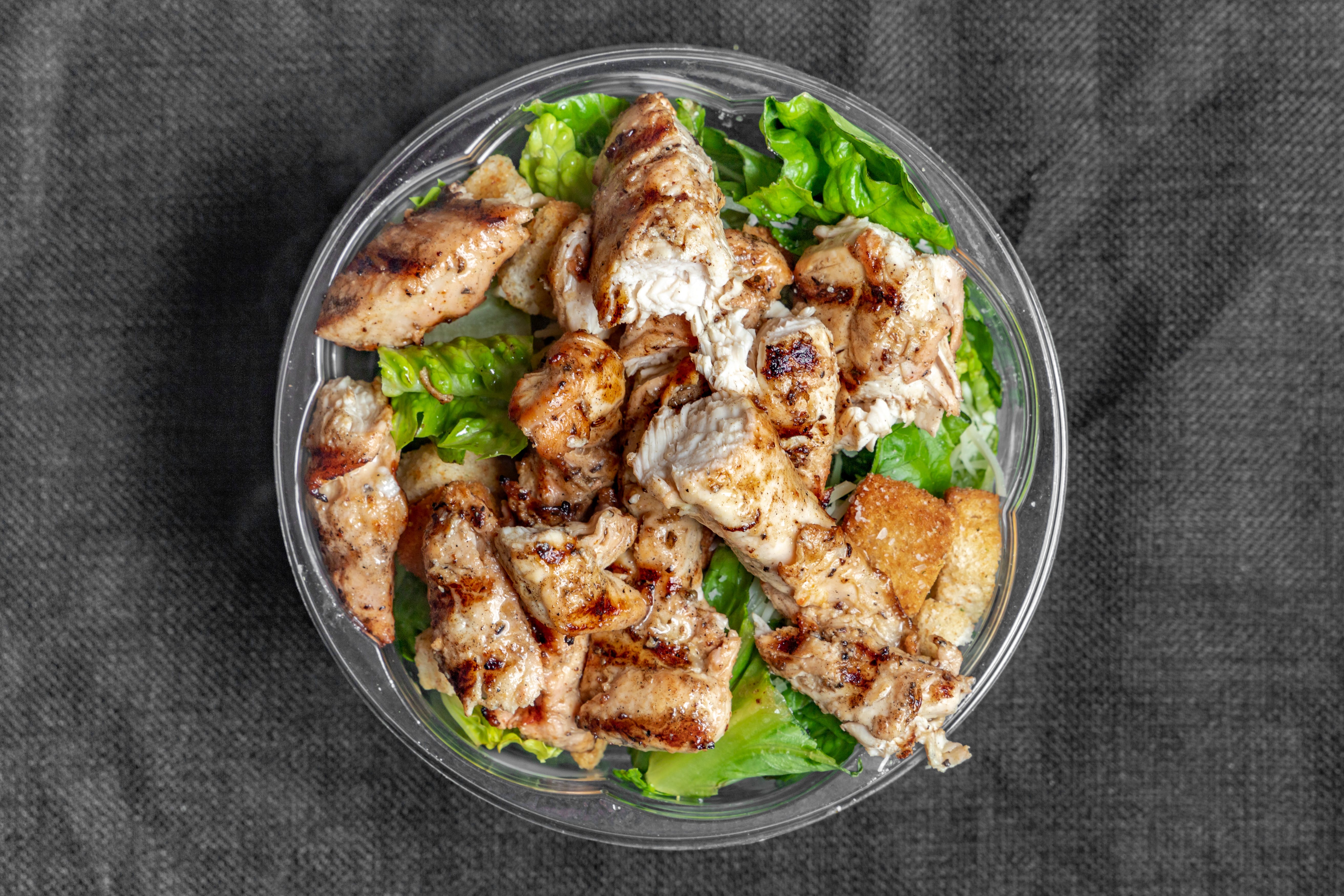 Order Caesar Salad with Chicken - Large food online from Primos restaurant store, Boston on bringmethat.com