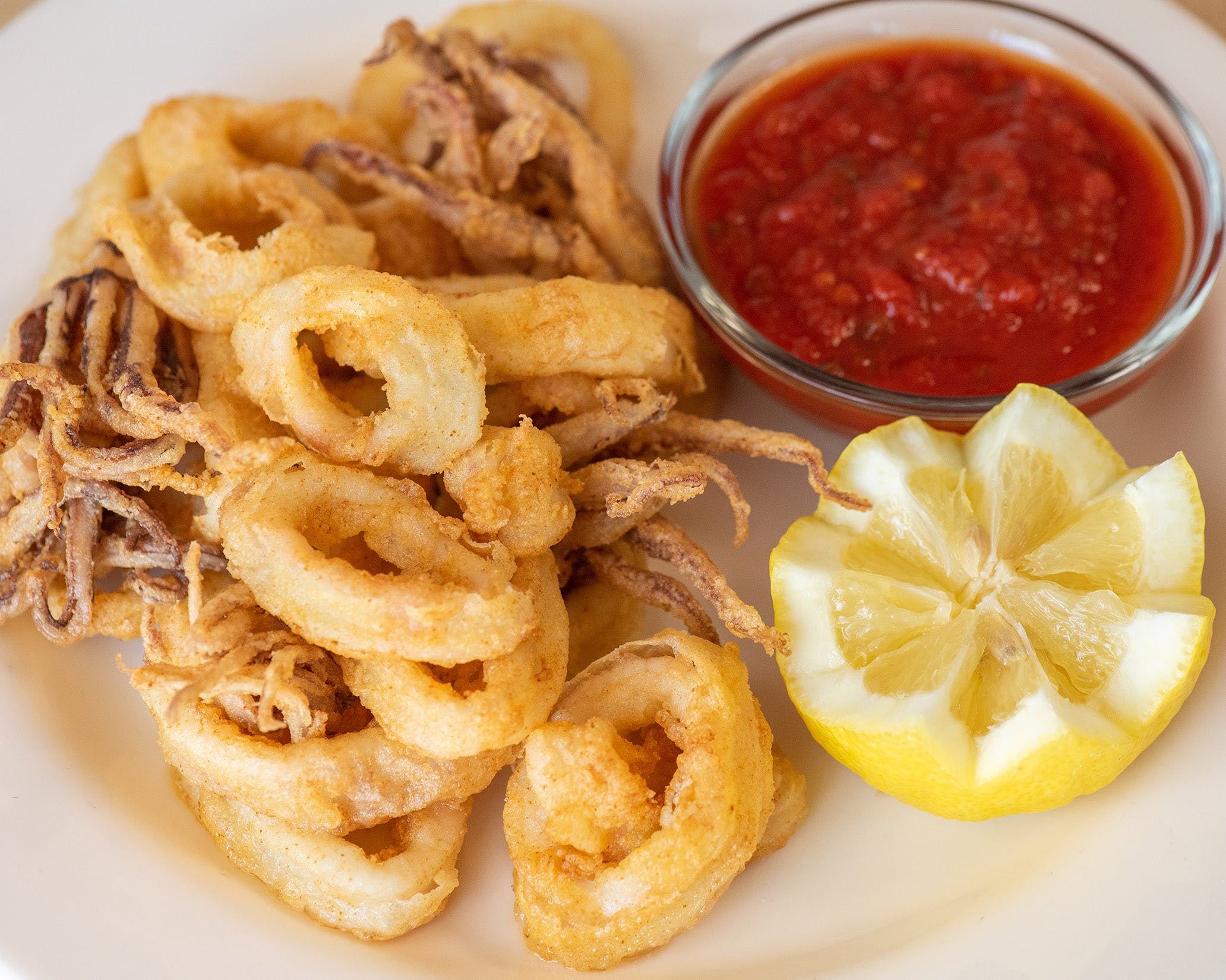 Order Fried Calamari - Appetizer food online from Pizza Palace store, Middletown on bringmethat.com