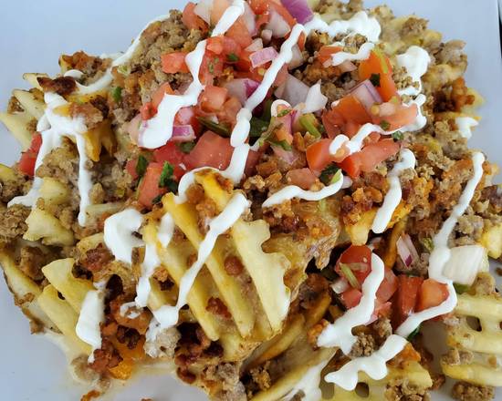 Order LOADED WAFFLE FRIES food online from Christine Casual Dining store, Green on bringmethat.com