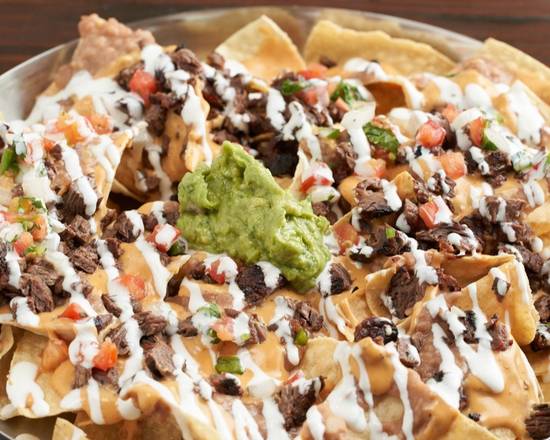 Order "JT" Nachos food online from Just Tacos And More store, Phoenix on bringmethat.com