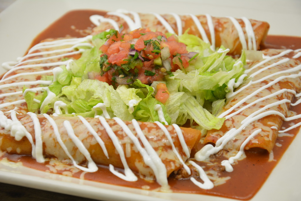Order Enchiladas Supreme Dinner food online from El Tapatio store, Raleigh on bringmethat.com