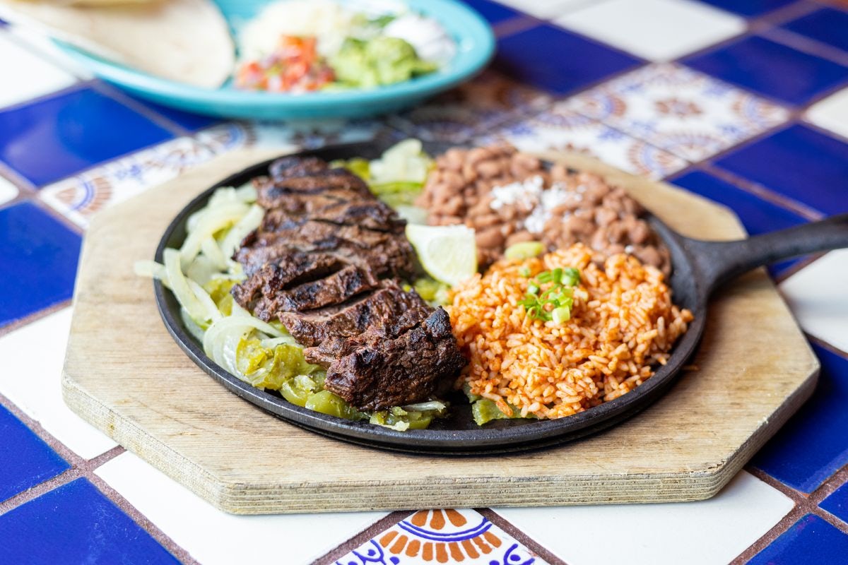 Order Steak Fajitas food online from Margaritas Mexican Restaurant store, Portland on bringmethat.com