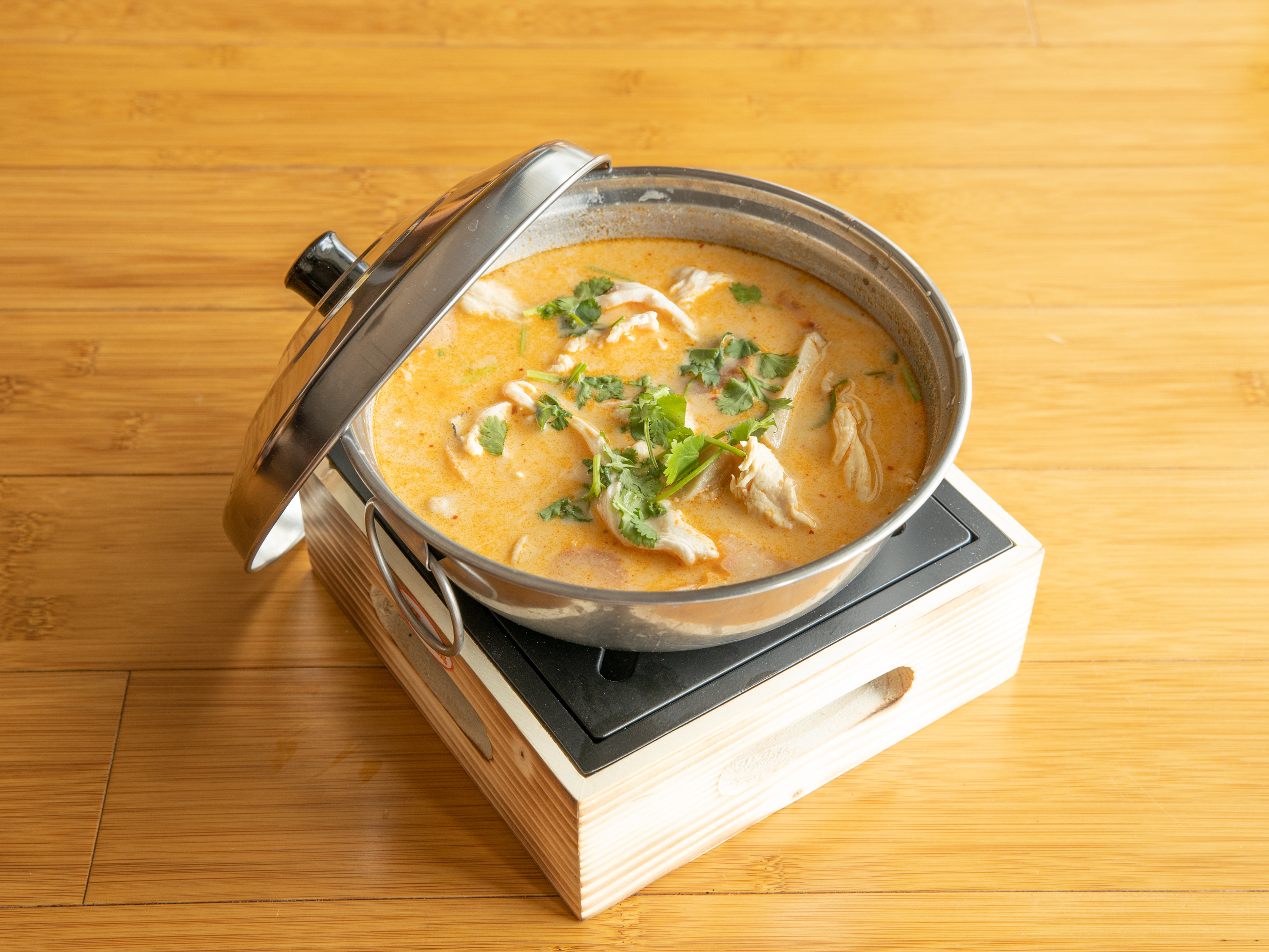 Order Tom Kha (Coconut Soup) food online from The Basil store, Long Beach on bringmethat.com