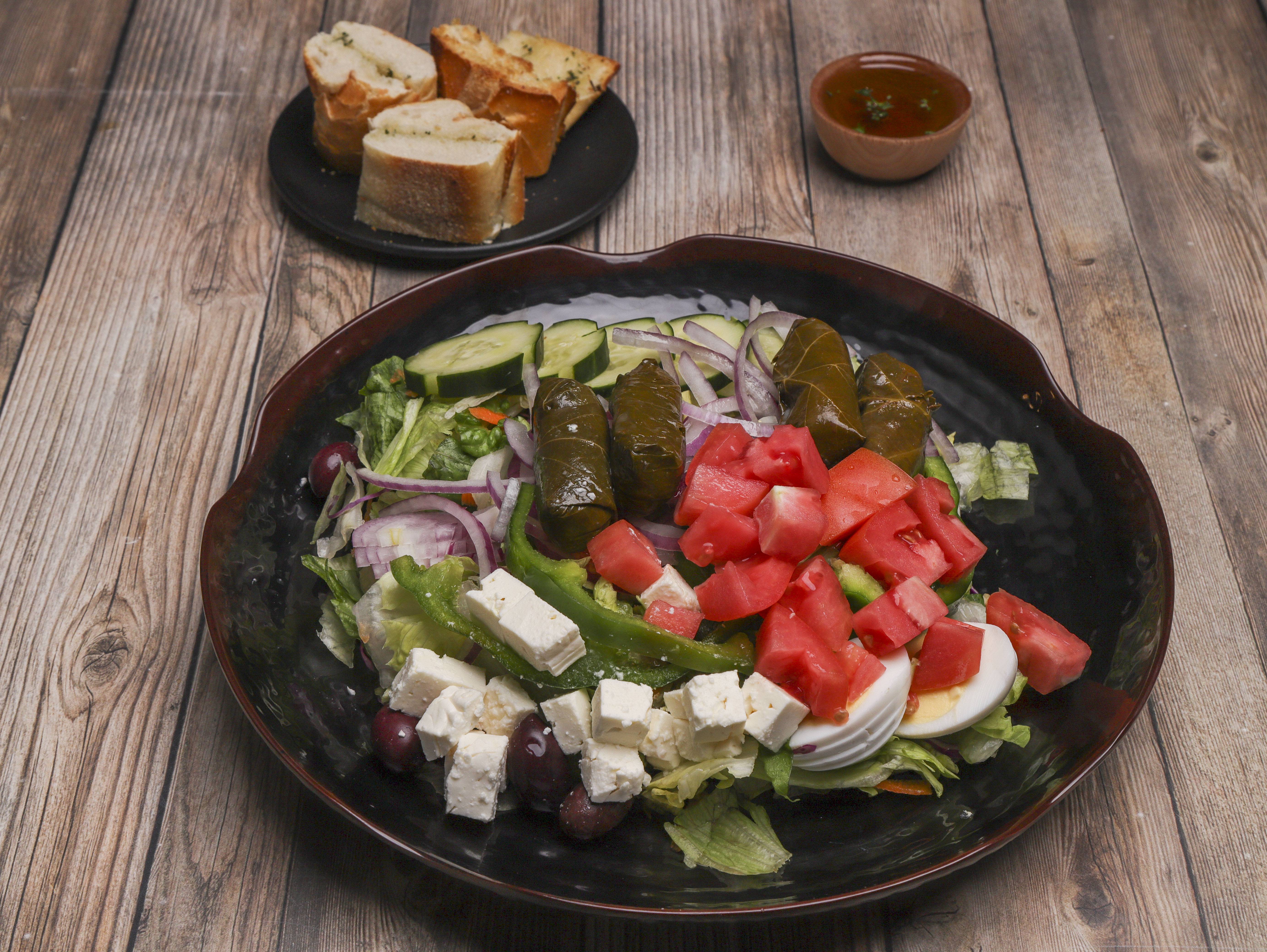 Order Greek Salad food online from Stella Pizzeria store, Philadelphia on bringmethat.com