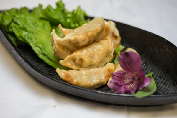 Order A9. Fried Pork Dumplings food online from 7 Star Asian Cafe store, Houston on bringmethat.com