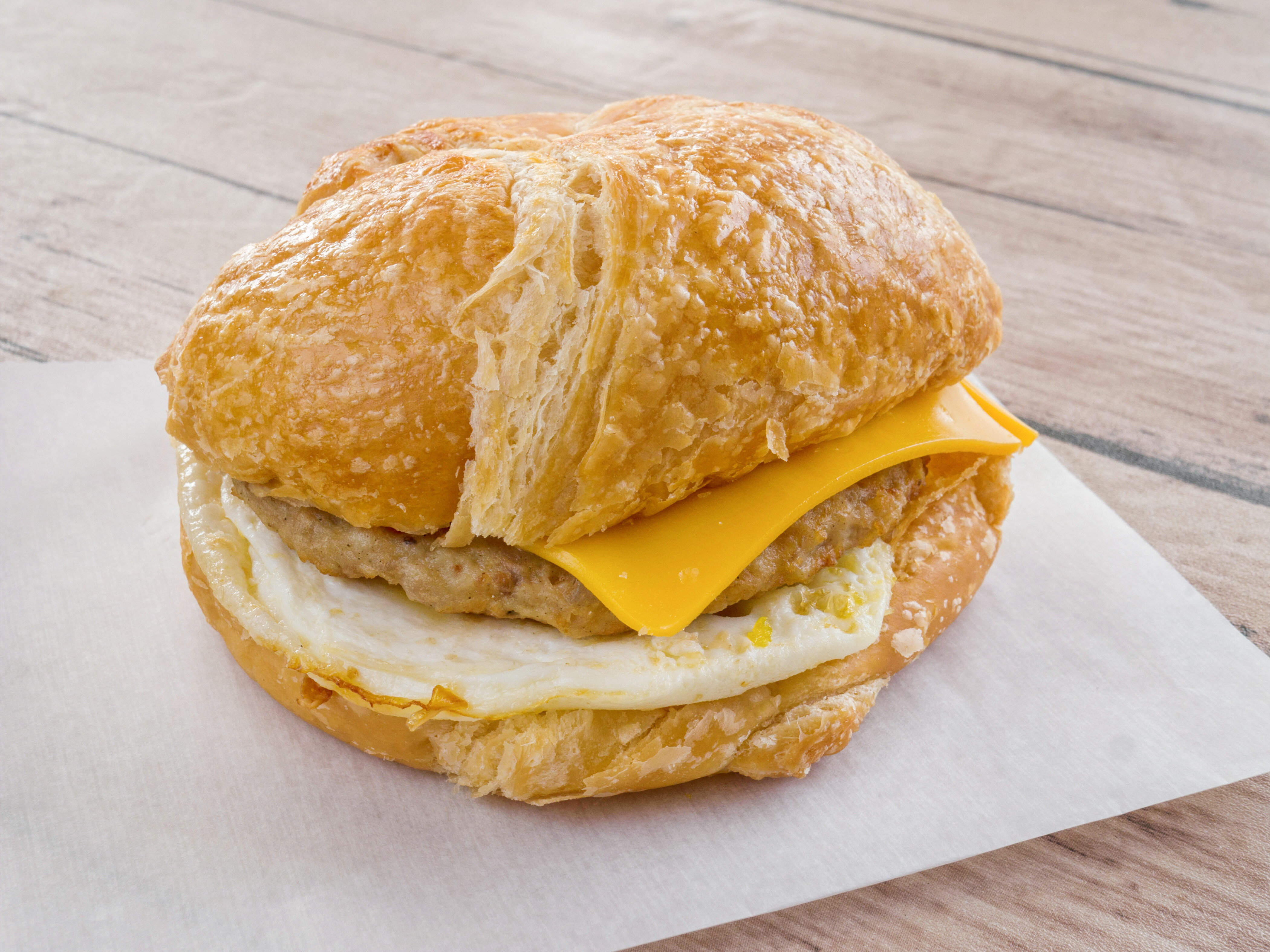 Order Sausage, Egg & Cheese Croissant food online from Le Donut store, Houston on bringmethat.com