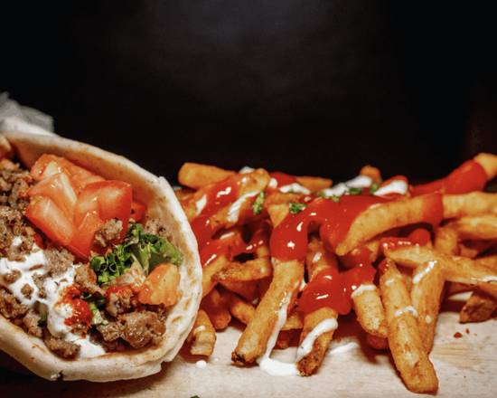 Order Gyro Wrap with Fries food online from Chik N Rice store, Perth Amboy on bringmethat.com
