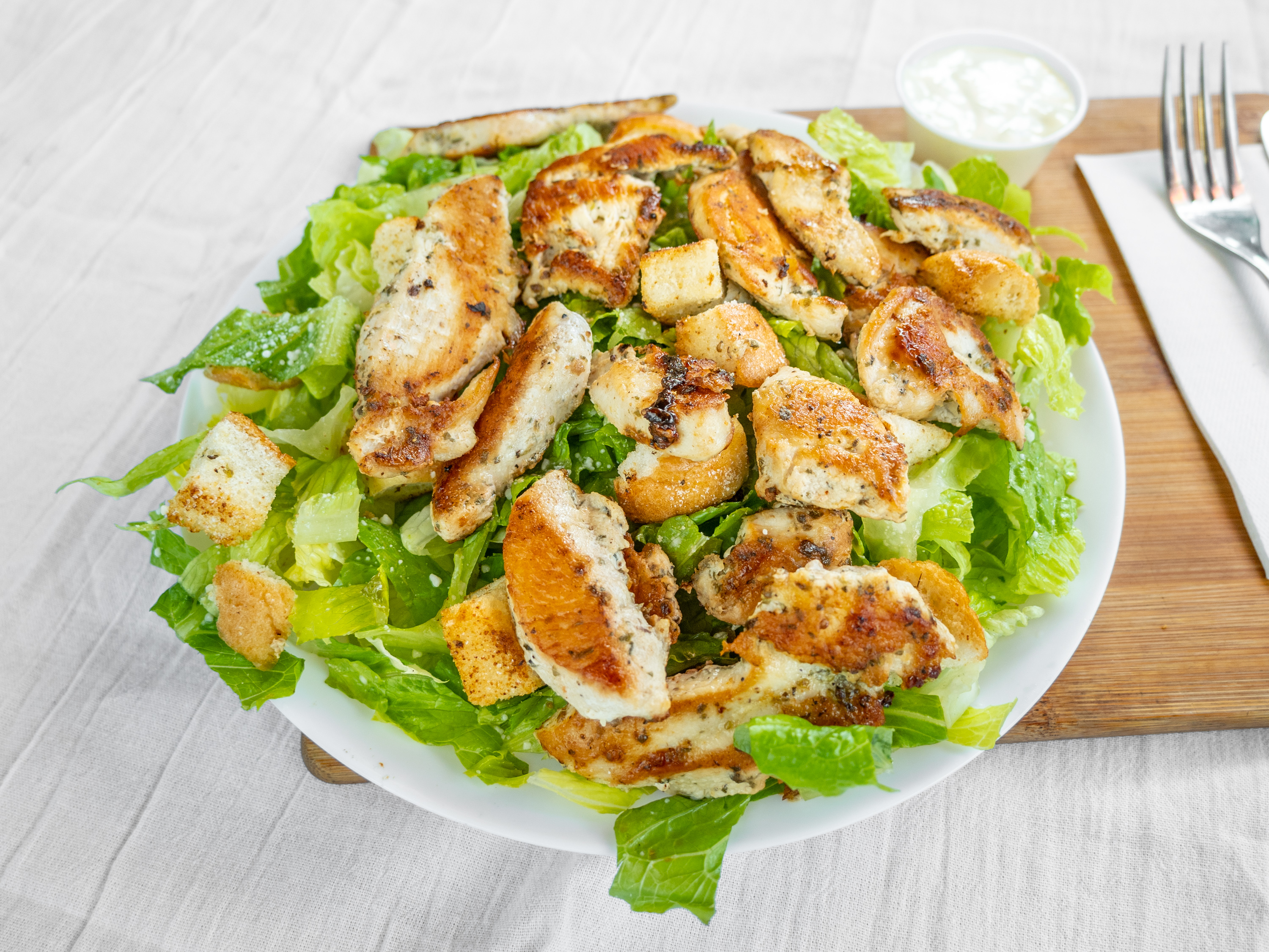 Order 10. Grilled Chicken Caesar Salad food online from Alltown Pizza store, Glenolden on bringmethat.com
