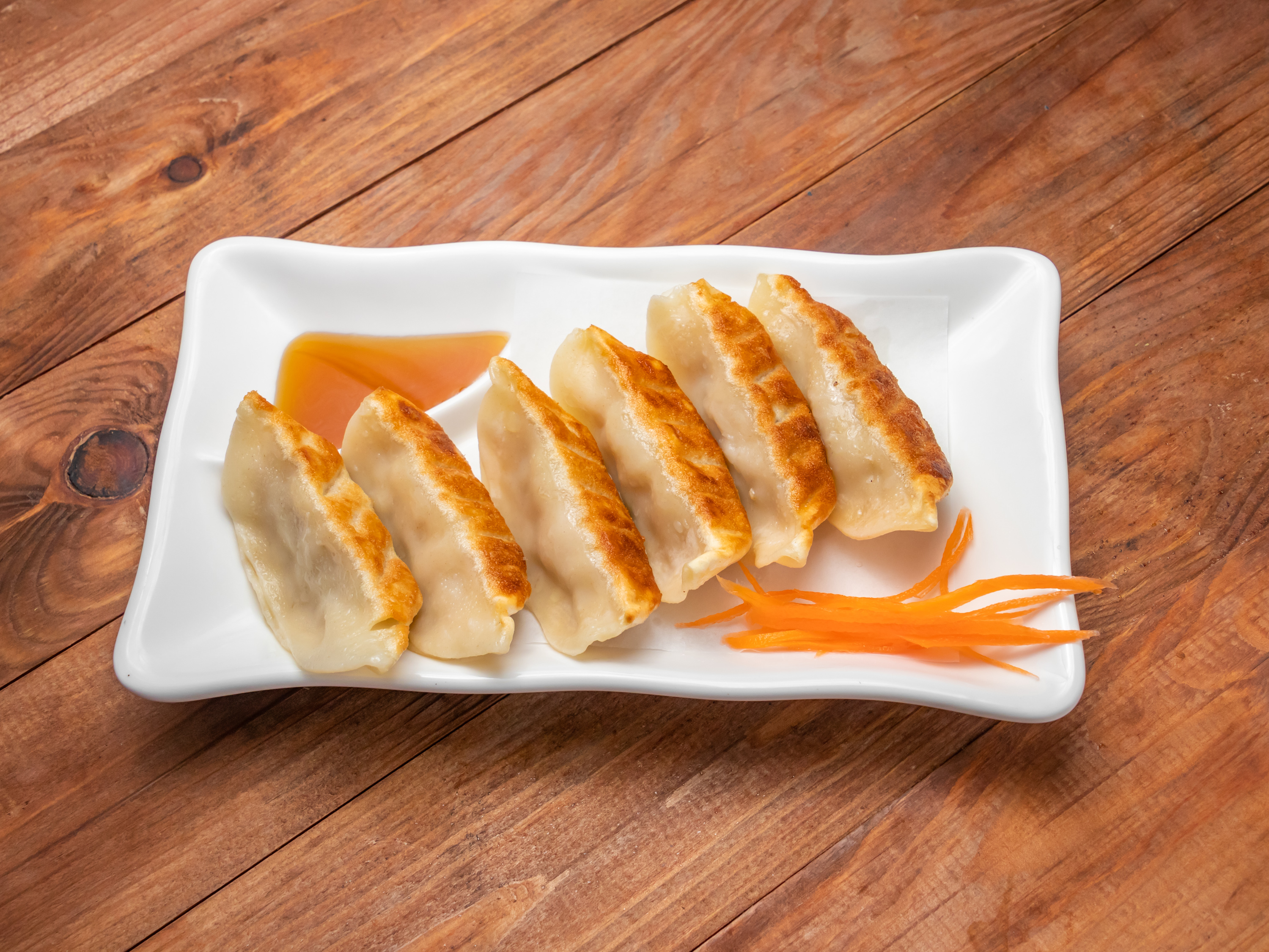 Order Pork Pot Stickers (6 pcs) food online from Spice 3:16 store, Cumming on bringmethat.com
