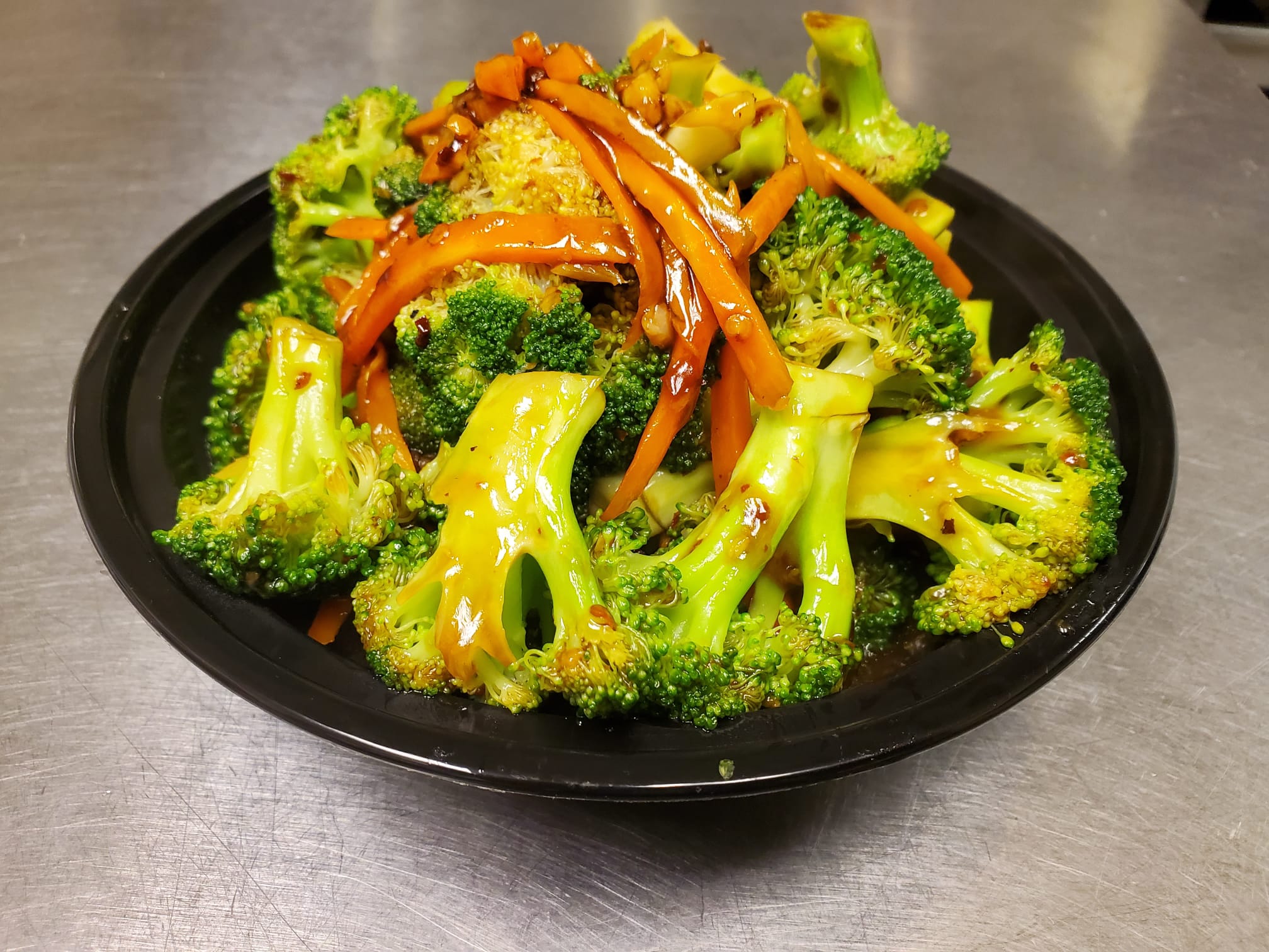 Order Broccoli in Garlic Sauce food online from Panda Kitchen store, Houston on bringmethat.com