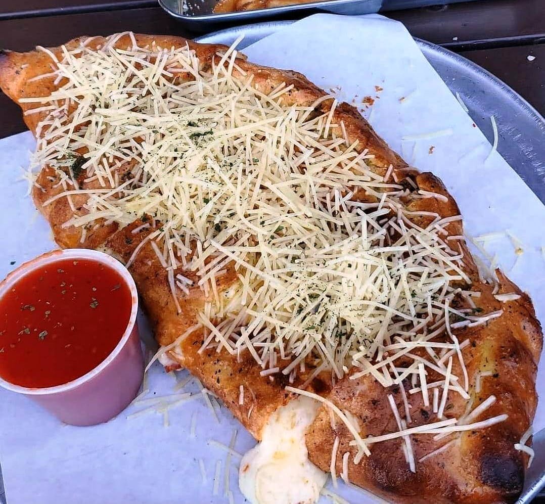 Order Calzone - Small food online from Napoli Pizza store, Henderson on bringmethat.com