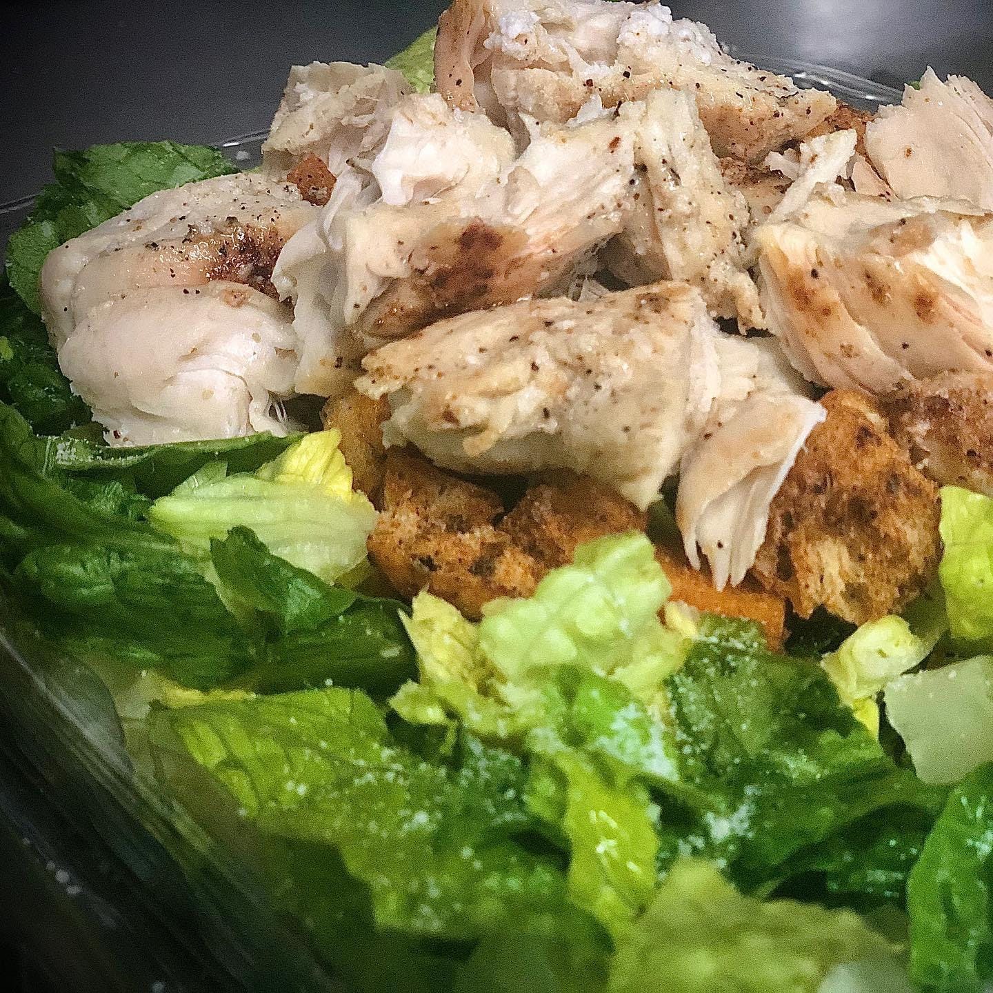 Order Chicken Caesar Salad - Salad food online from Kelley Square Pizza store, Worcester on bringmethat.com