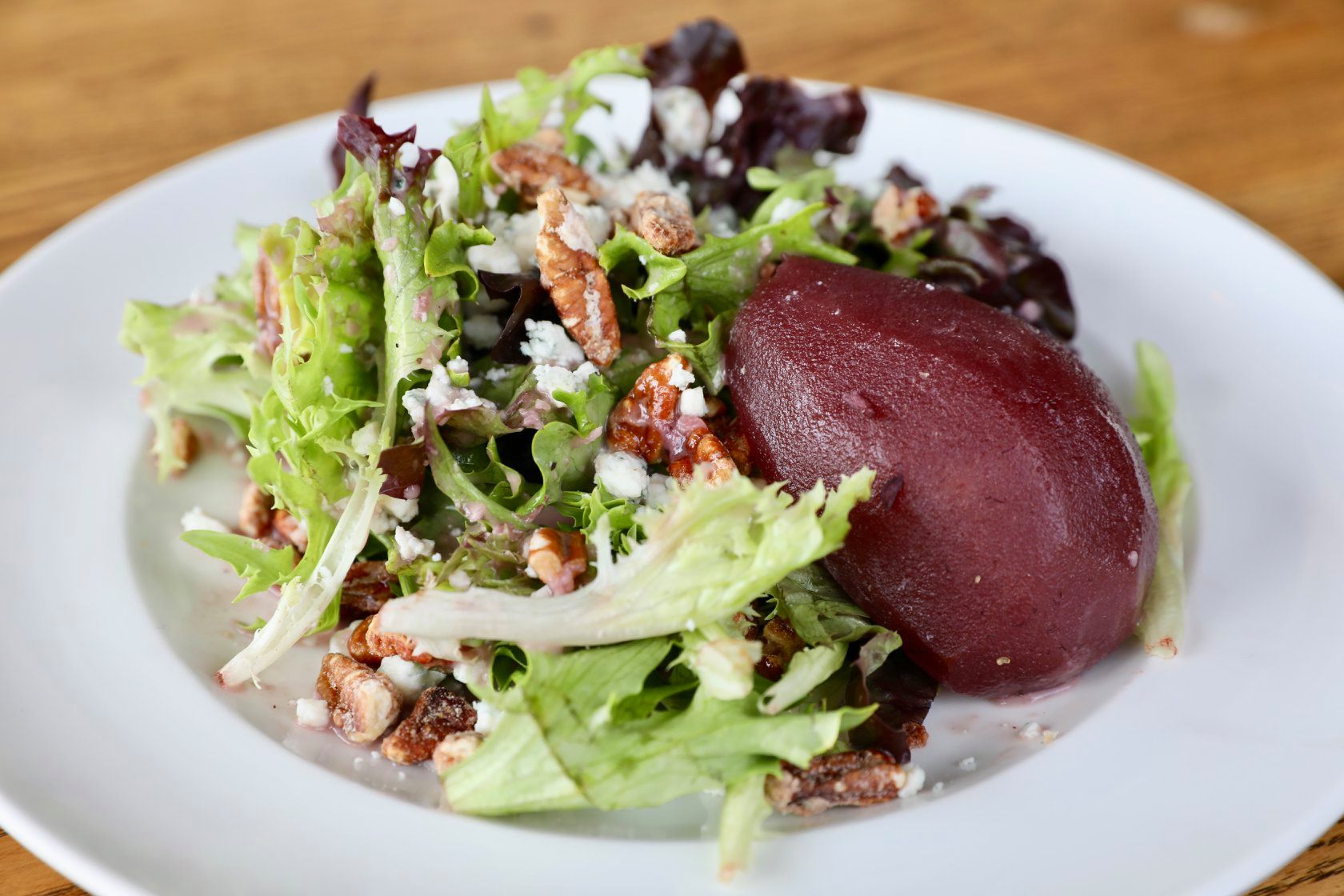 Order Poached Pear Salad food online from Salt Factory store, Alpharetta on bringmethat.com