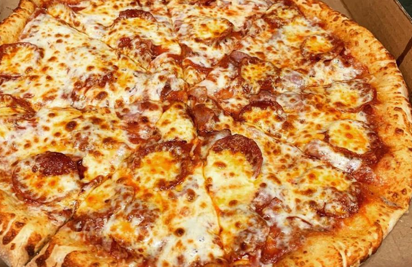 Order Meat Lover Pizza food online from Aladdin's Kitchen store, Washington on bringmethat.com