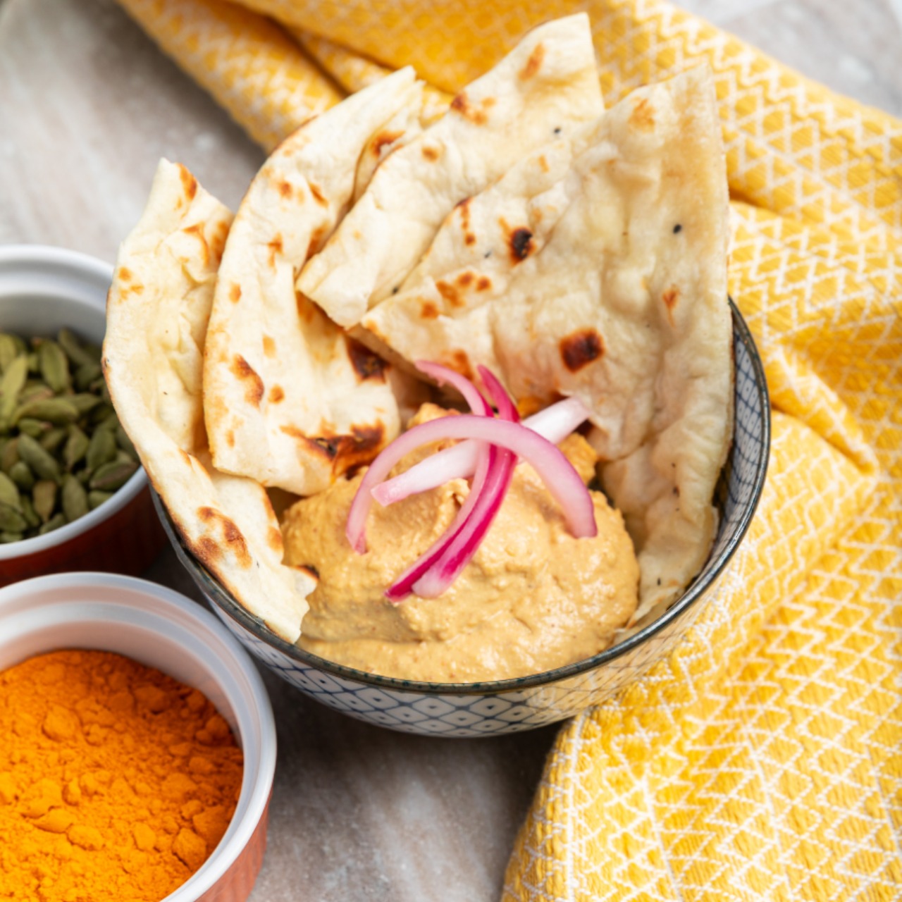 Order BFC Hummus + Half Naan food online from The Bombay Frankie Company store, Culver City on bringmethat.com