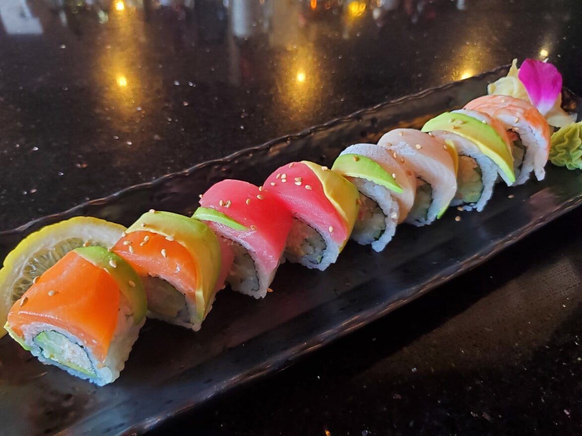 Order Rainbow Roll  ( with Real Crab ) food online from Tsui Sushi Bar store, Seattle on bringmethat.com