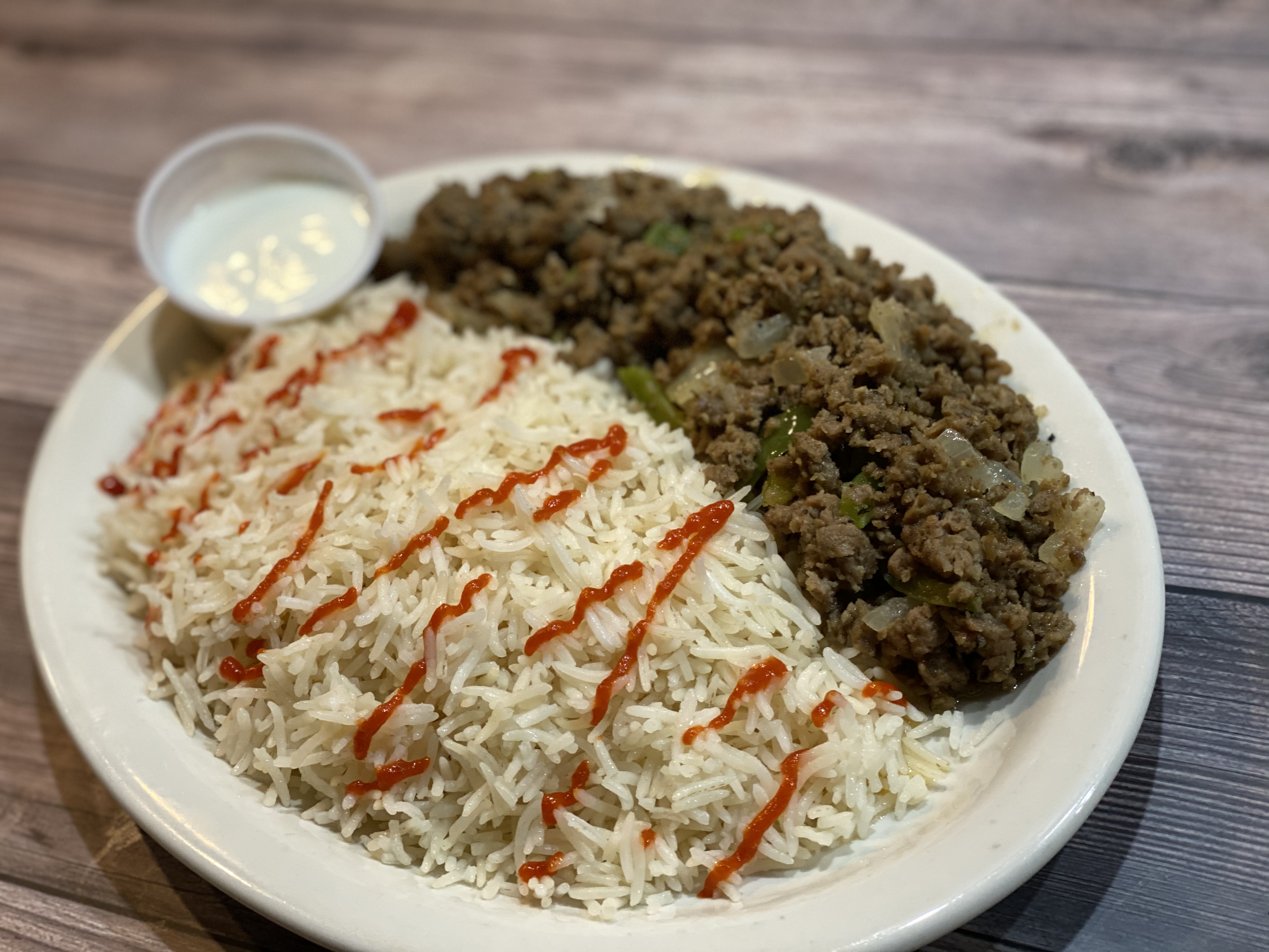 Order Lamb gyro over rice food online from The Kabul Fresh Grill store, Baltimore on bringmethat.com