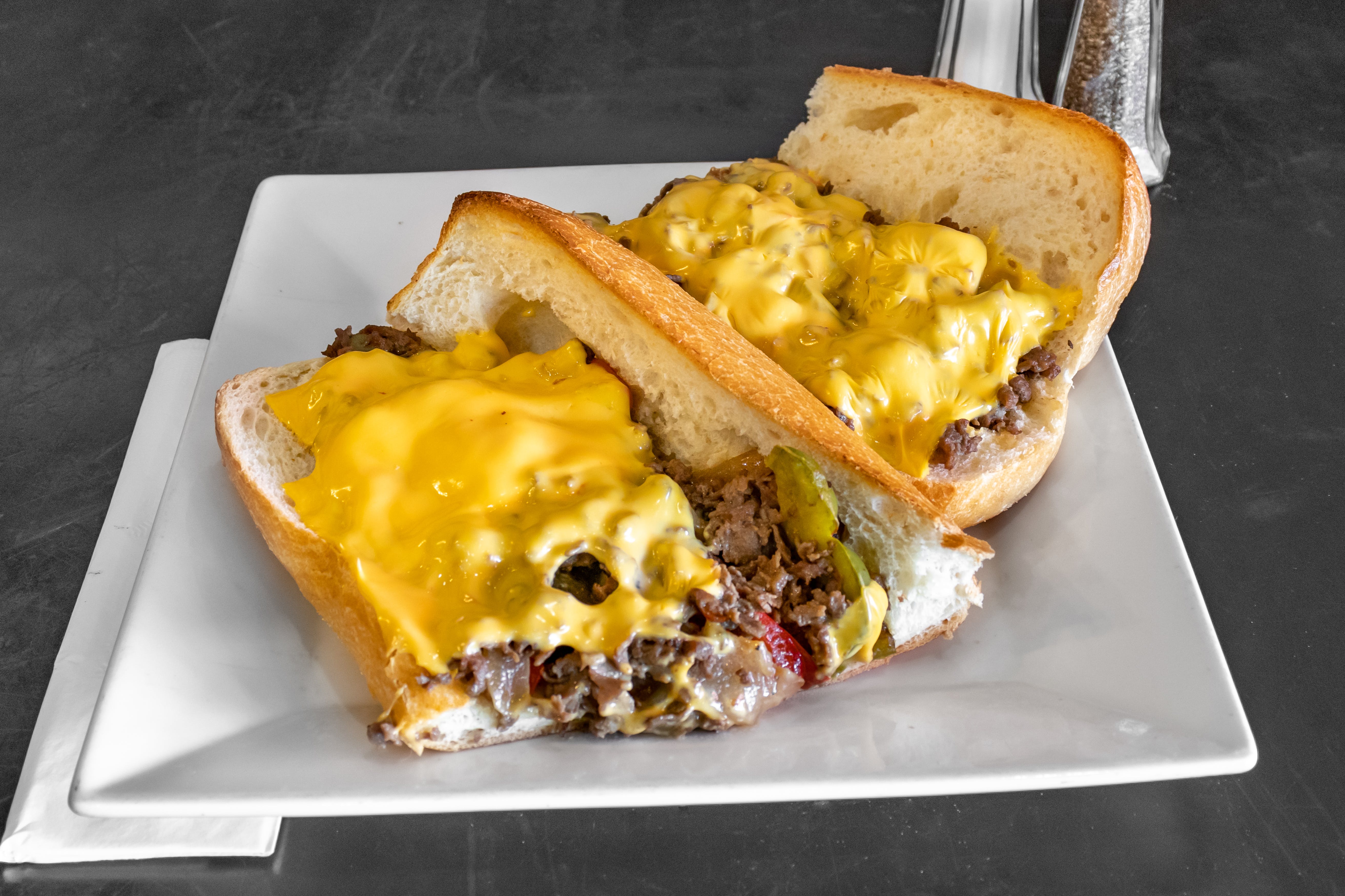 Order Philly Cheesesteak Sandwich - Sandwich food online from Europa Pizza store, Carmel on bringmethat.com