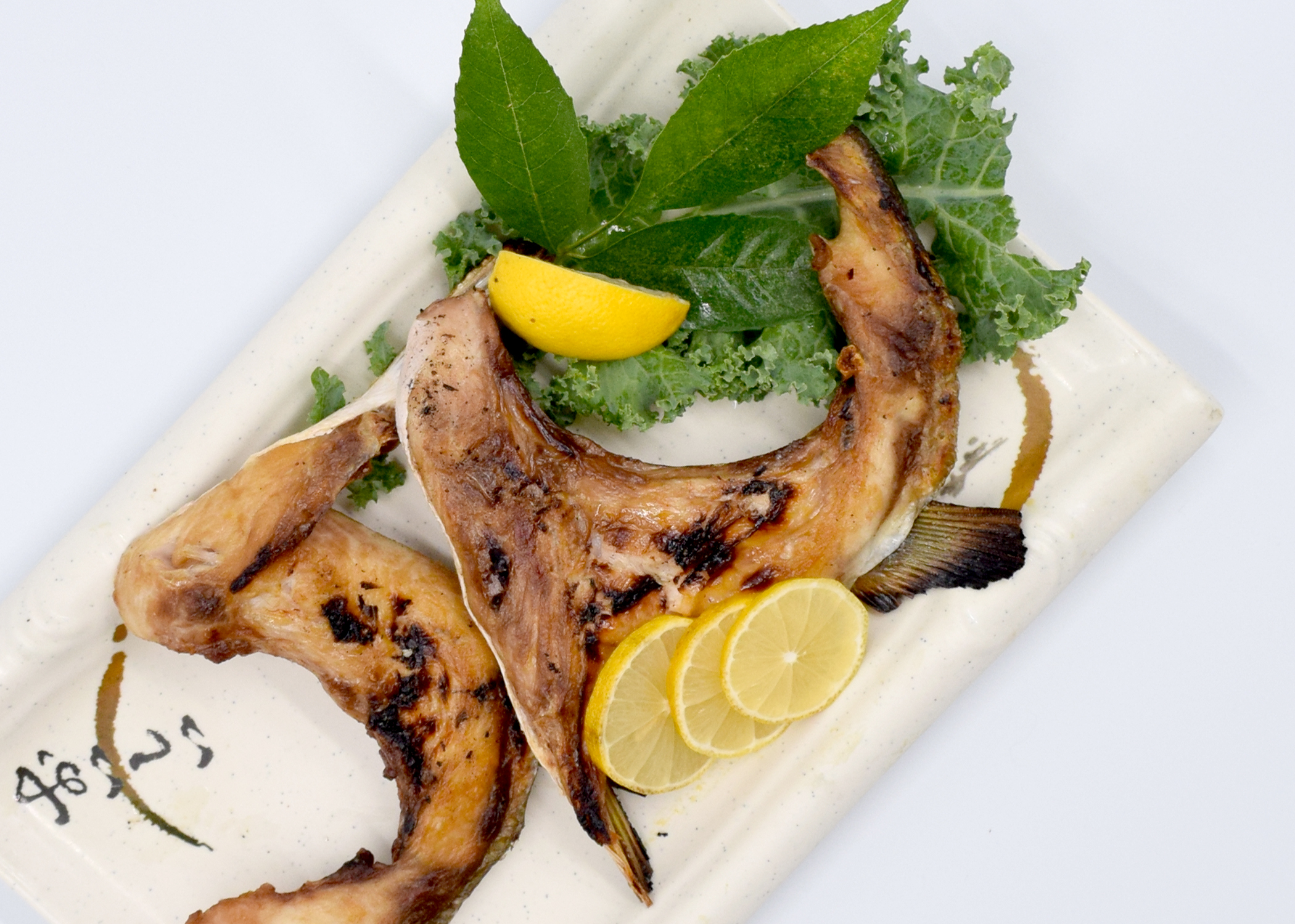 Order Yellowtail Grilled Kama Plate  food online from Mansun Japanese Restaurant store, Walnut on bringmethat.com