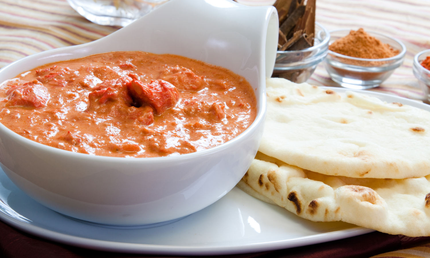 Order Butter Chicken food online from Halal Pita Grill store, Chicago on bringmethat.com