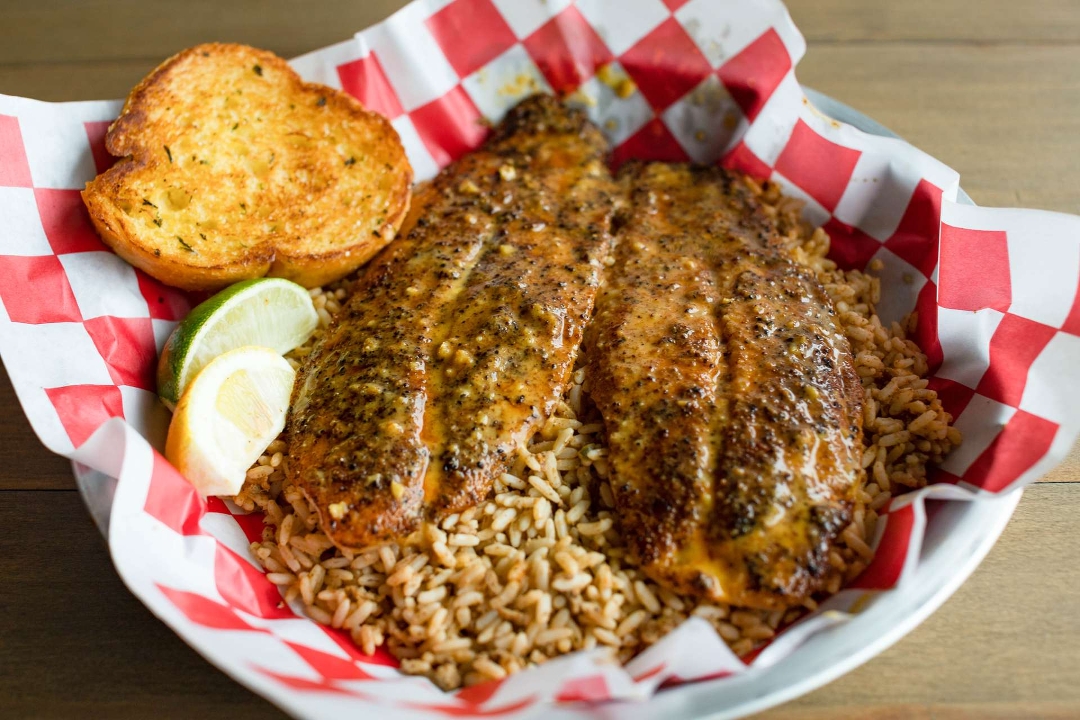 Order 2 Blackened Fish* food online from 7 Spice Cajun Seafood store, Humble on bringmethat.com