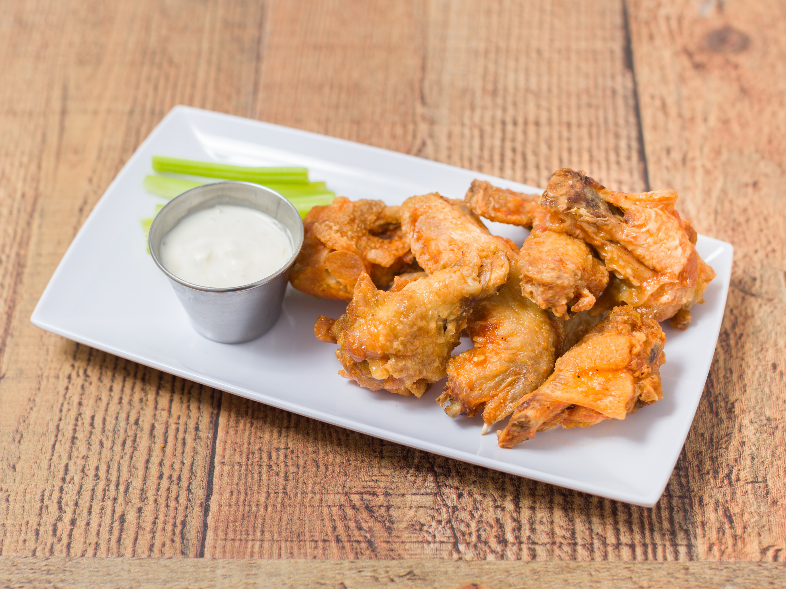 Order Buffalo Chicken Wings 8 piece food online from New Yummy Taco store, Brooklyn on bringmethat.com