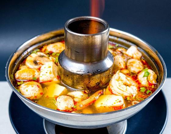 Order Tom Yum | Hot Pot food online from Blue Orchid Thai Bistro store, Palm Desert on bringmethat.com