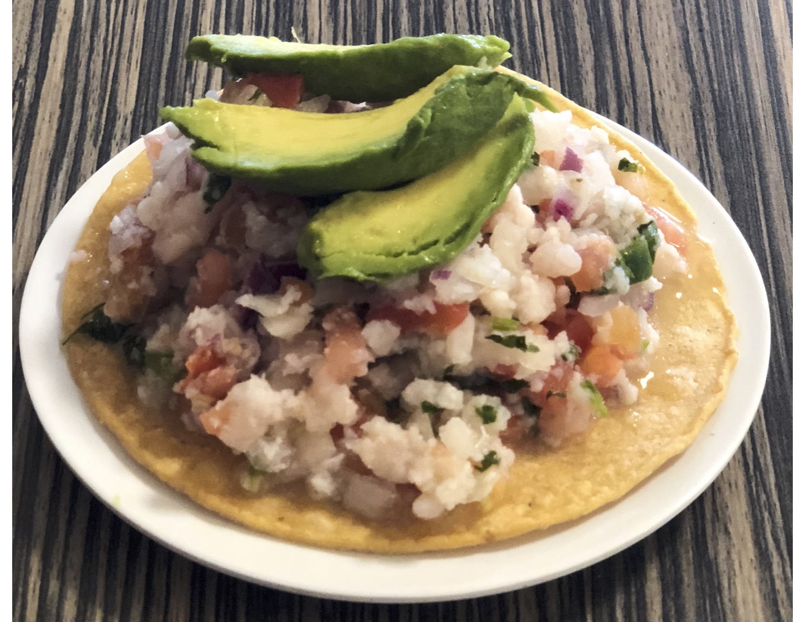 Order Fish Ceviche Tostada food online from Dulce Antojitos store, Pittsburg on bringmethat.com