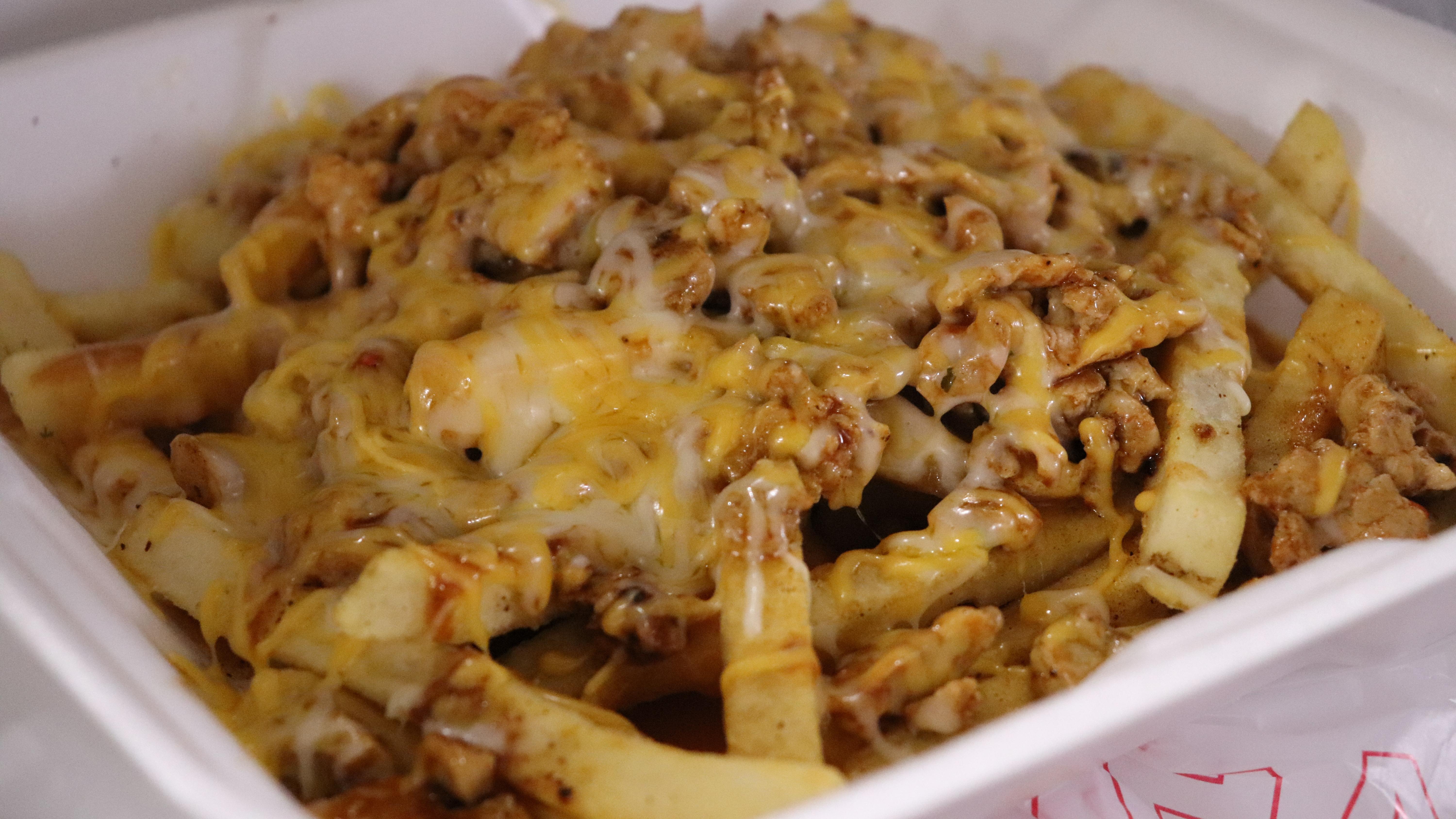 Order Asada Fries food online from Iguana Grill & Cantina store, Bakersfield on bringmethat.com
