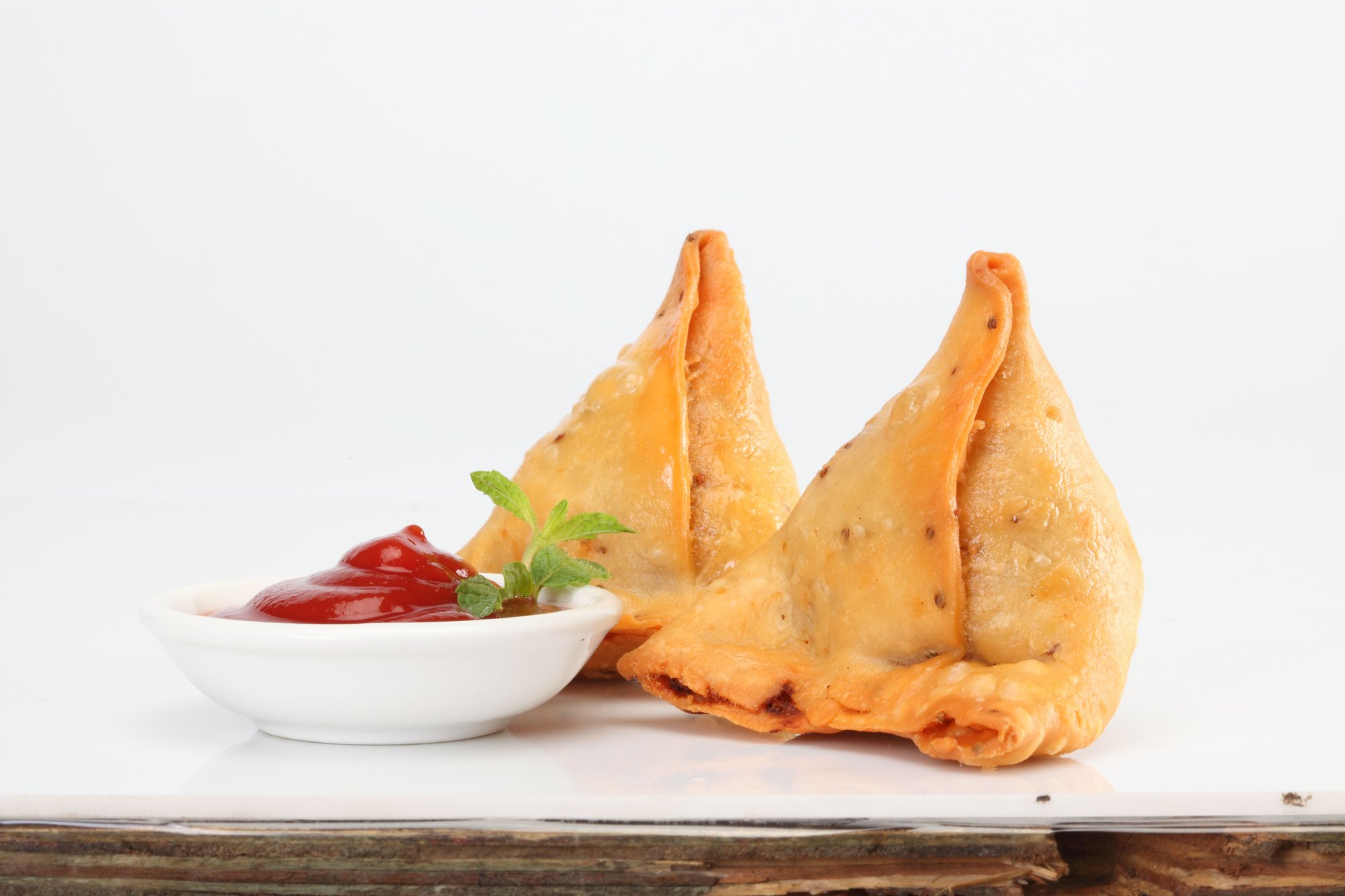 Order Samosa food online from Sangam Cafe store, Morrisville on bringmethat.com