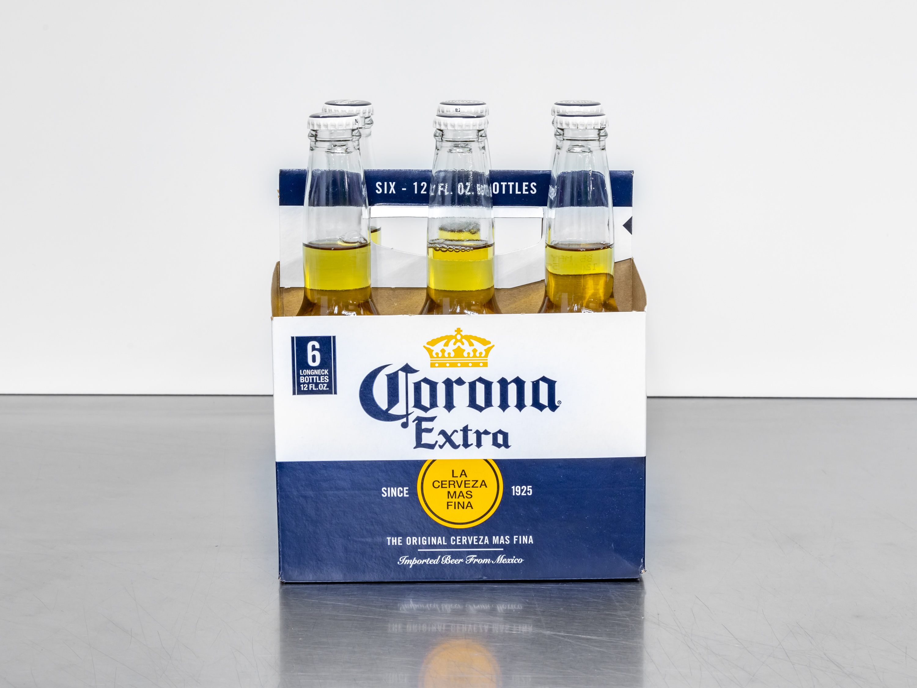 Order Corona Extra 6 Pack 12 oz. Bottles food online from In The Zone Vi store, Apache Junction on bringmethat.com