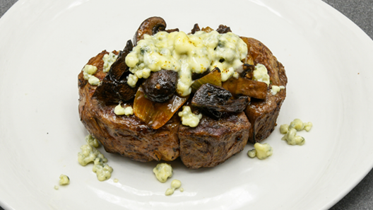 Order Gorgonzola Crusted Ribeye 16oz food online from Mitchell Steakhouse store, Columbus on bringmethat.com