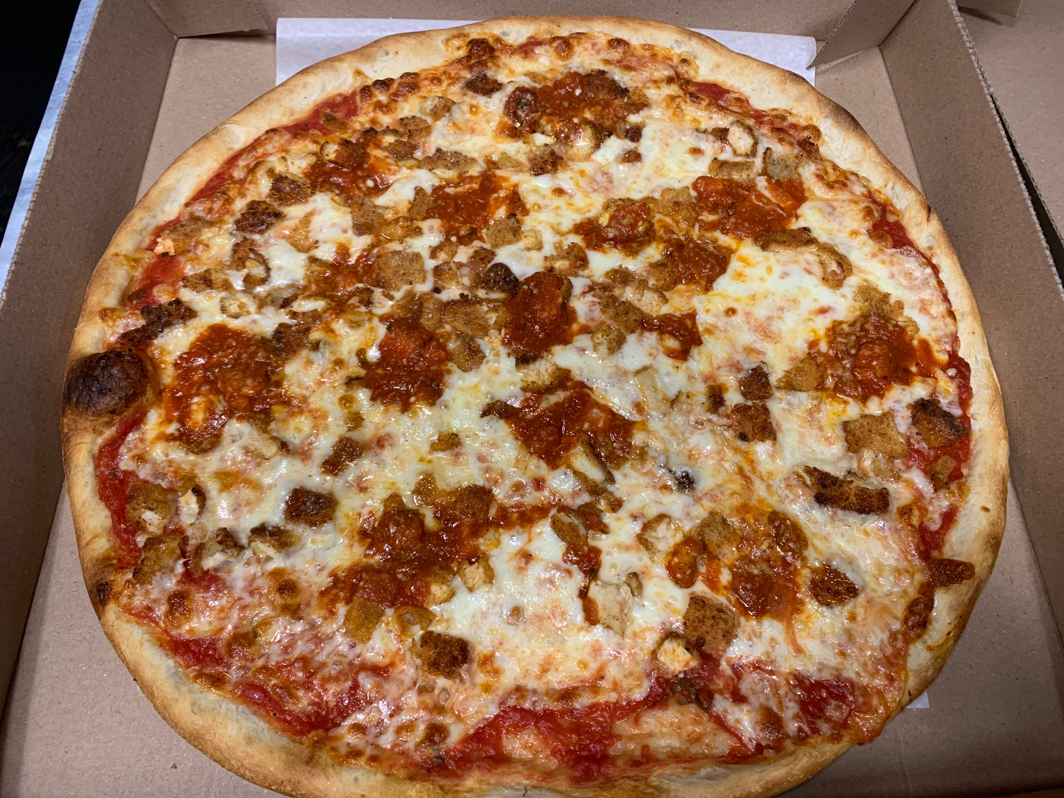 Order Chicken Parmigiana Pizza - Personal food online from Rodolfo Pizzeria store, South Plainfield on bringmethat.com