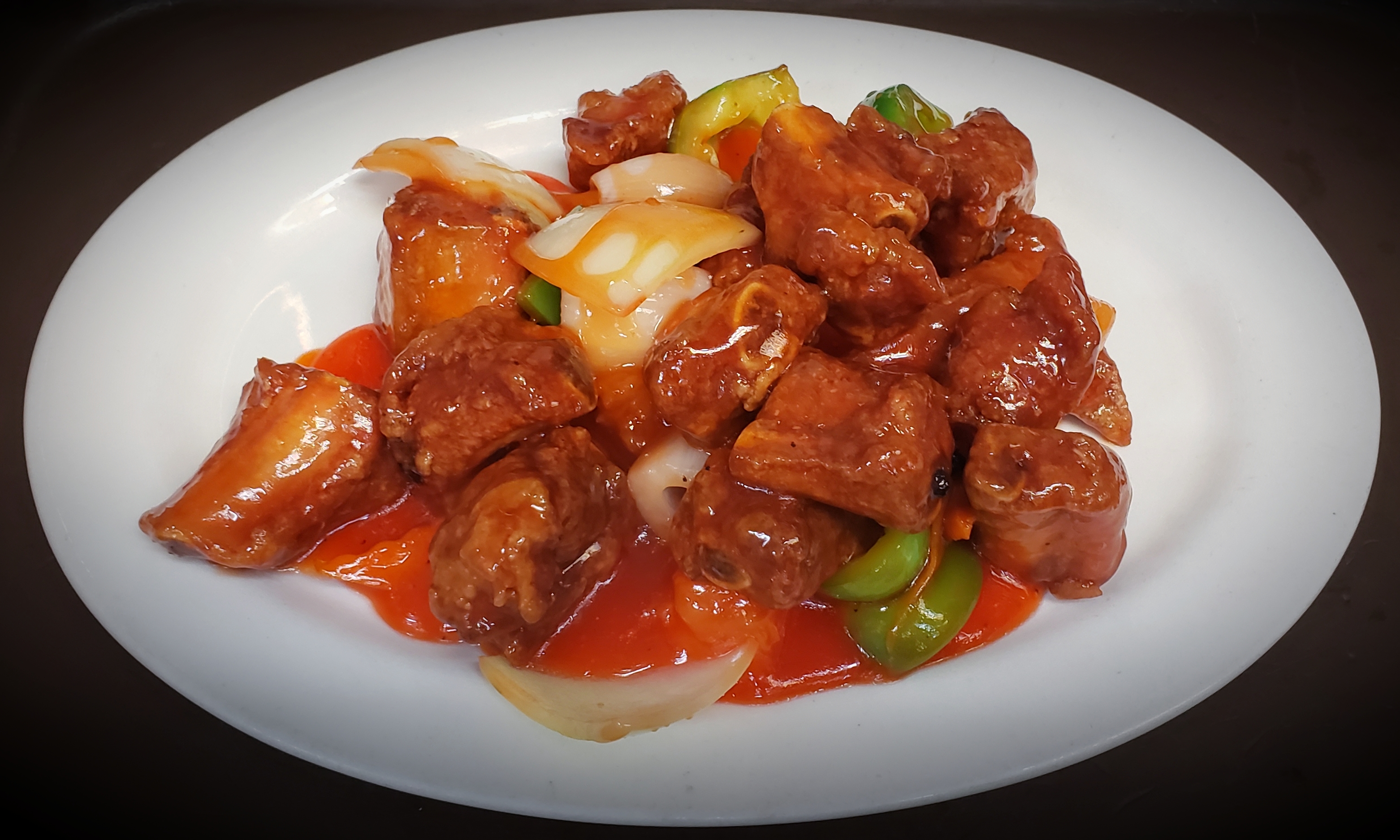 Order 406C. Spareribs with Sweet and Sour Sauce food online from Thien Hoang Restaurant store, Portland on bringmethat.com