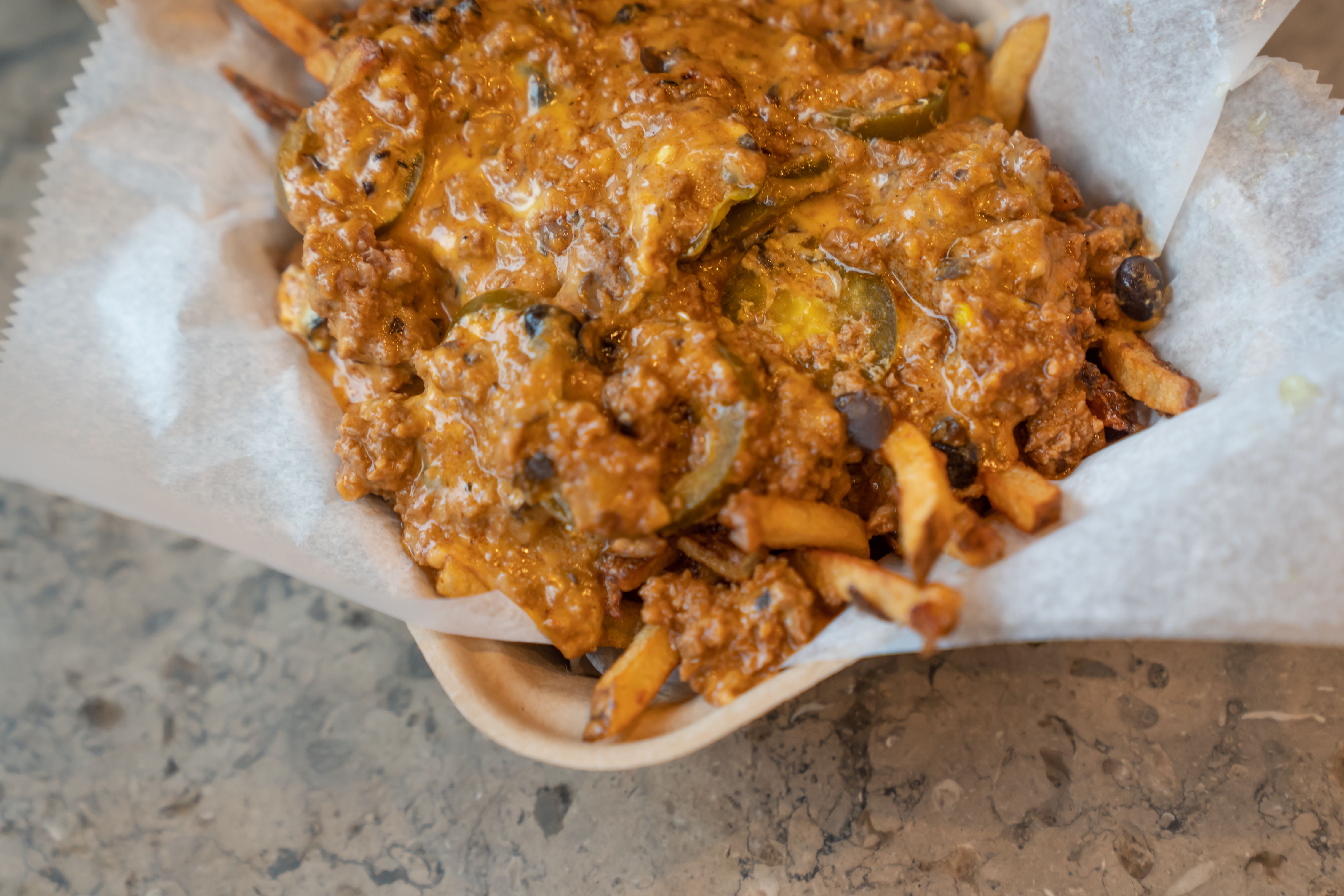Order Chili Cheese and Jalapeno Fries food online from Harlem Burger Co. store, New York on bringmethat.com